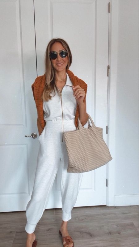 Casual and comfortable outfit.
Perfect for traveling to a warmer destination! 
I love this naghedi tote, so beautiful and chic. The jumpsuit is so stretchy and soft. 
Everything fits true to size, I am wearing size small.

#LTKover40 #LTKtravel #LTKstyletip
