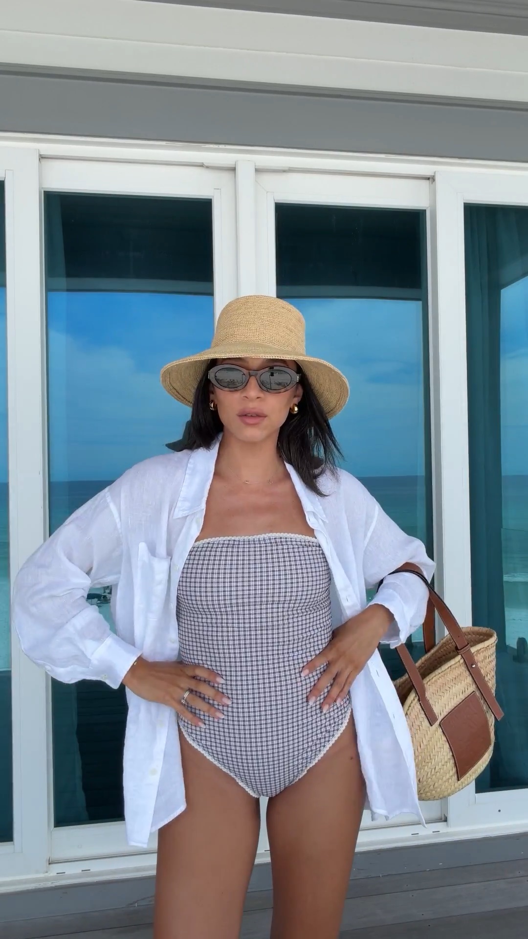 Family beach vacation outfit! Super flattering and modest one piece swim that’s reversible with my favorite linen button down shirt and raffia bucket hat. These sunglasses and beach bag are pricey but the cost per wear has been almost zero I wear them so much!

#LTKSwim #LTKootd #LTKmomlife