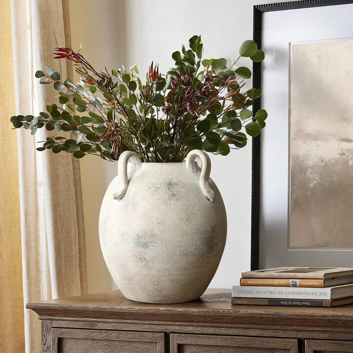 This amphora vase brings a vintage-inspired look to your home with its rounded silhouette and wea... | Wayfair North America