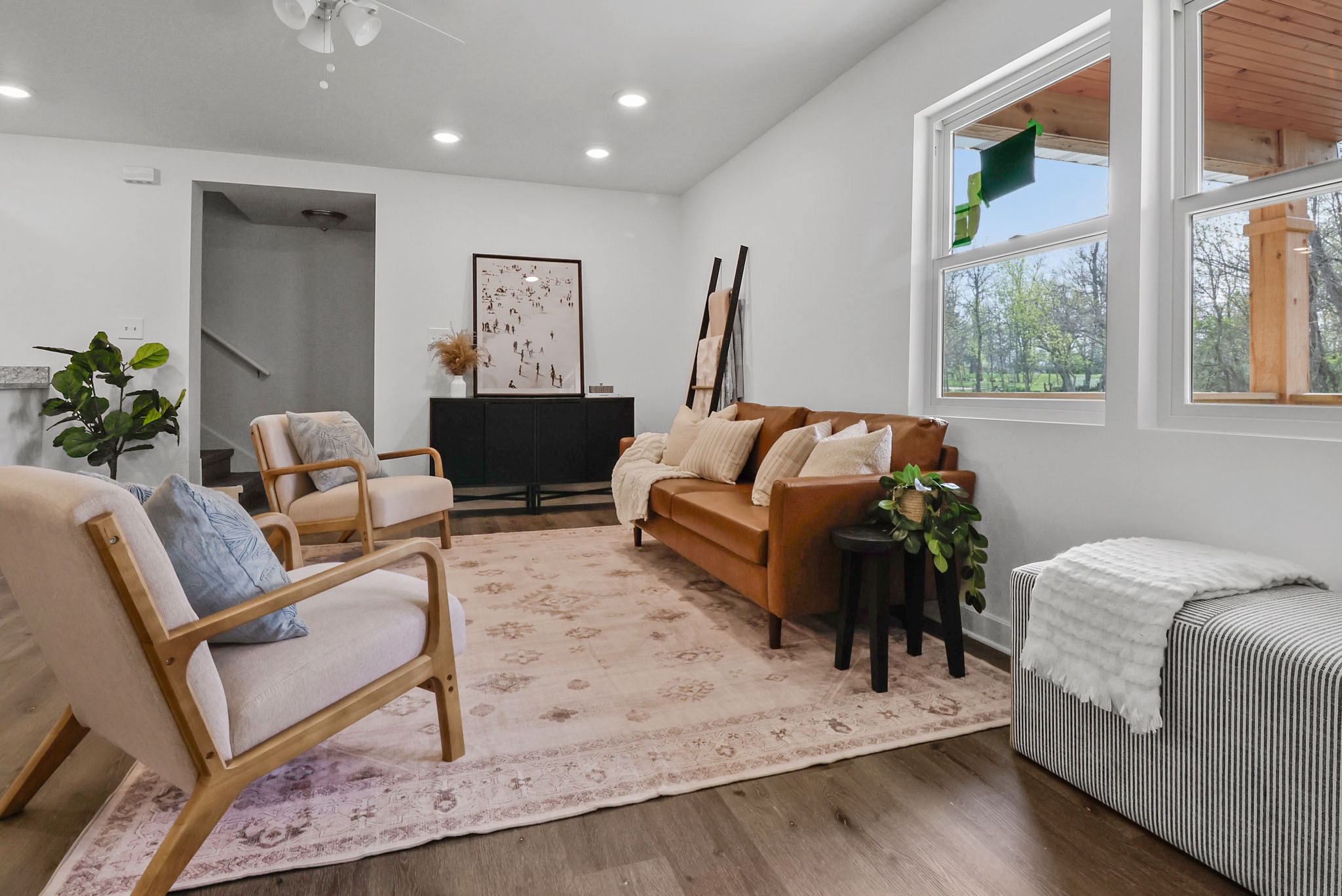 Home staging a cozy coastal lake cottage. I love this sofa, it works for so many spaces and styles! And these chairs are a great price- I have used them for staging and suggested them to design clients to fill the corner of a room where they don’t want to spend a ton of money. They fit in beautifully in a room full of higher end furniture. 

#LTKHome #LTKSaleAlert