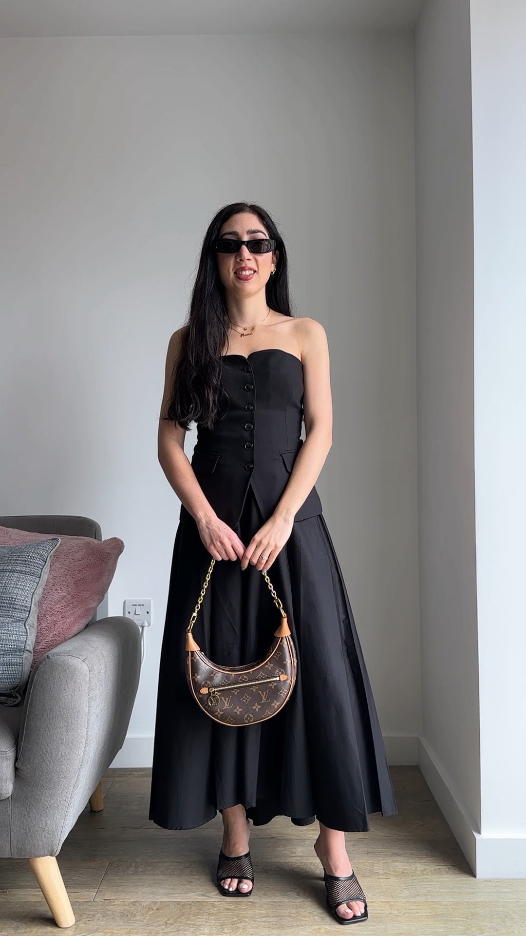 Circular skirt, a-line long skirt, black corset, louis vuitton loop bag, saint laurent oval sunglasses, black outfit, ootd

#LTKeurope #LTKFind #LTKstyletip