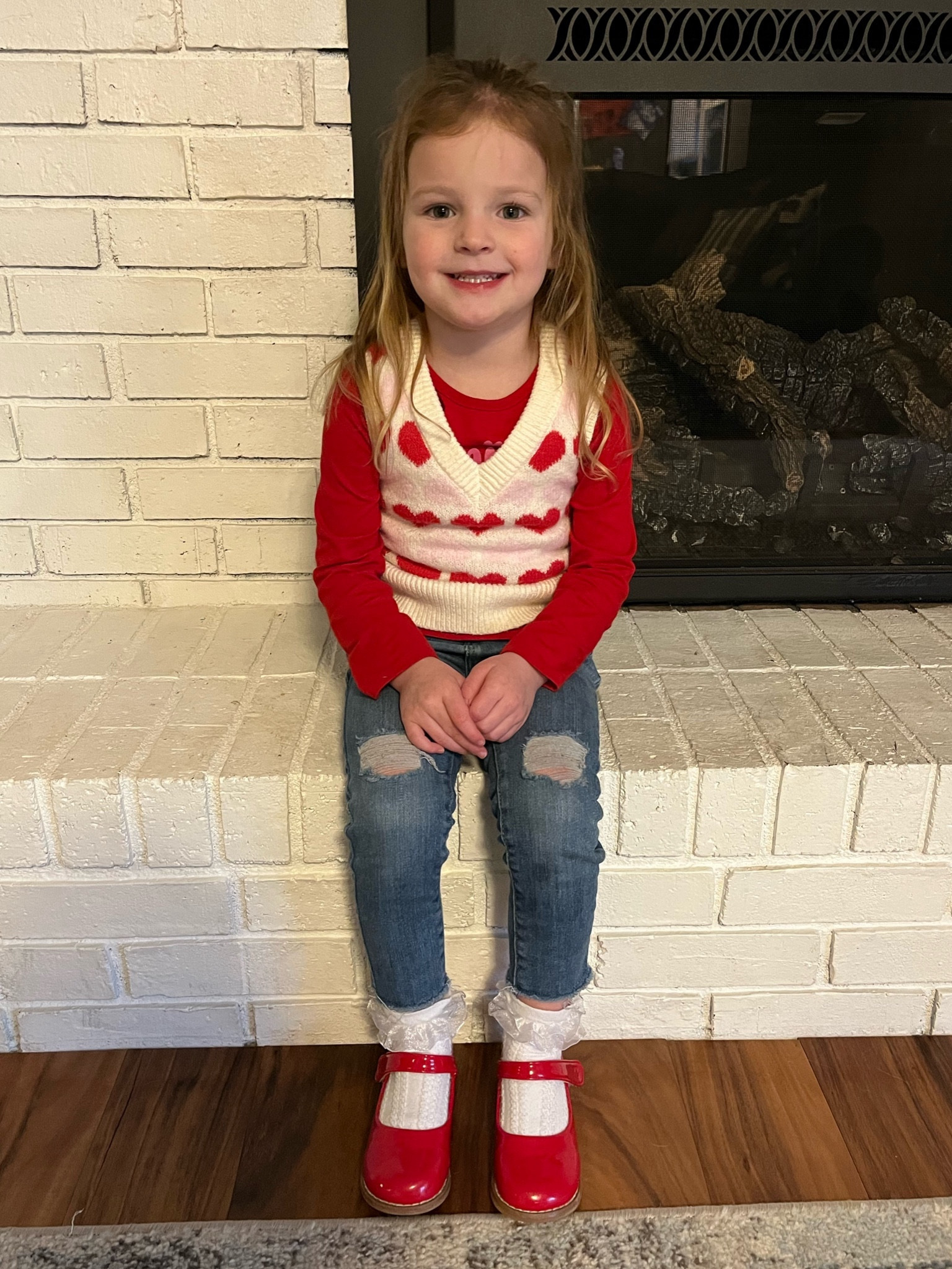 Toddler girl Valentine’s Day outfit, heart sweater vest, red long sleeve, ripped skinny jeans with raw hem, ruffle socks and red Mary Jane’s 

#LTKfindsunder100 #LTKfindsunder50 #LTKkids