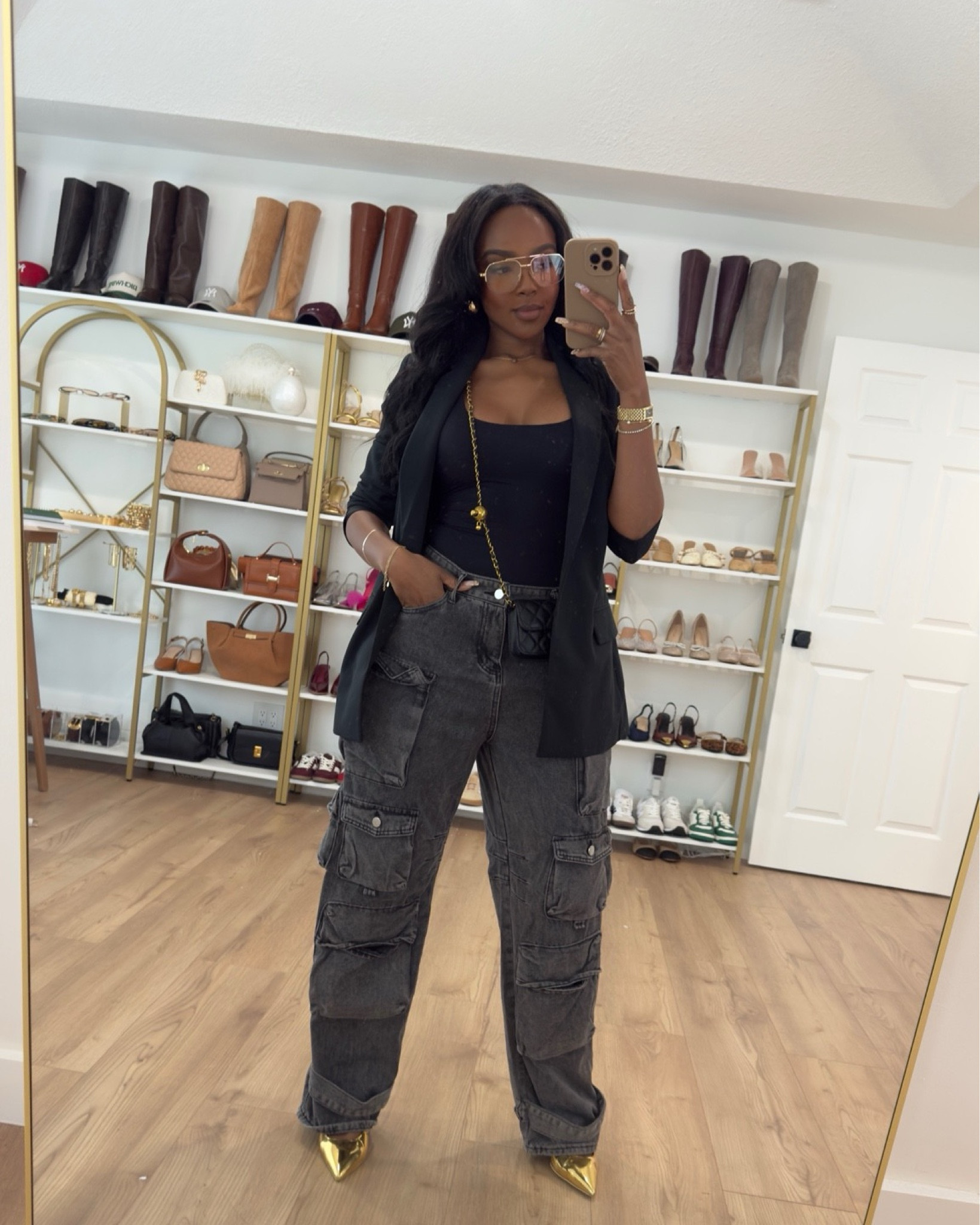 Cargo pants paired with a black top and a stylish blazer, complemented by a mini-inspired bag featuring gold accents. Complete the look with gold heels, chunky gold earrings, and sunglasses. 

|•Size small I’m 5’4 | 140lbs | 36D -27 -40  IG & YT: kirasfashionfinds TT: kiraabboud•|



#LTKMostLoved #LTKStyleTip #LTKU