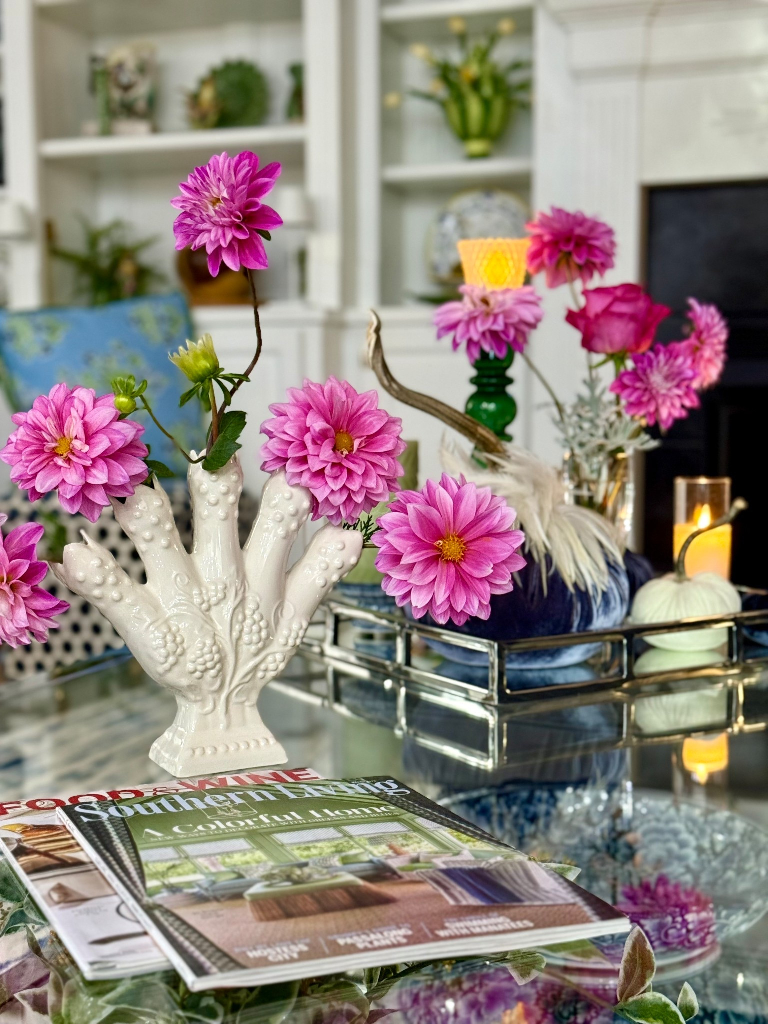 Dahlias in a vintage five finger vase share the table with beautiful velvet pumpkins. 

#LTKHome #LTKSeasonal