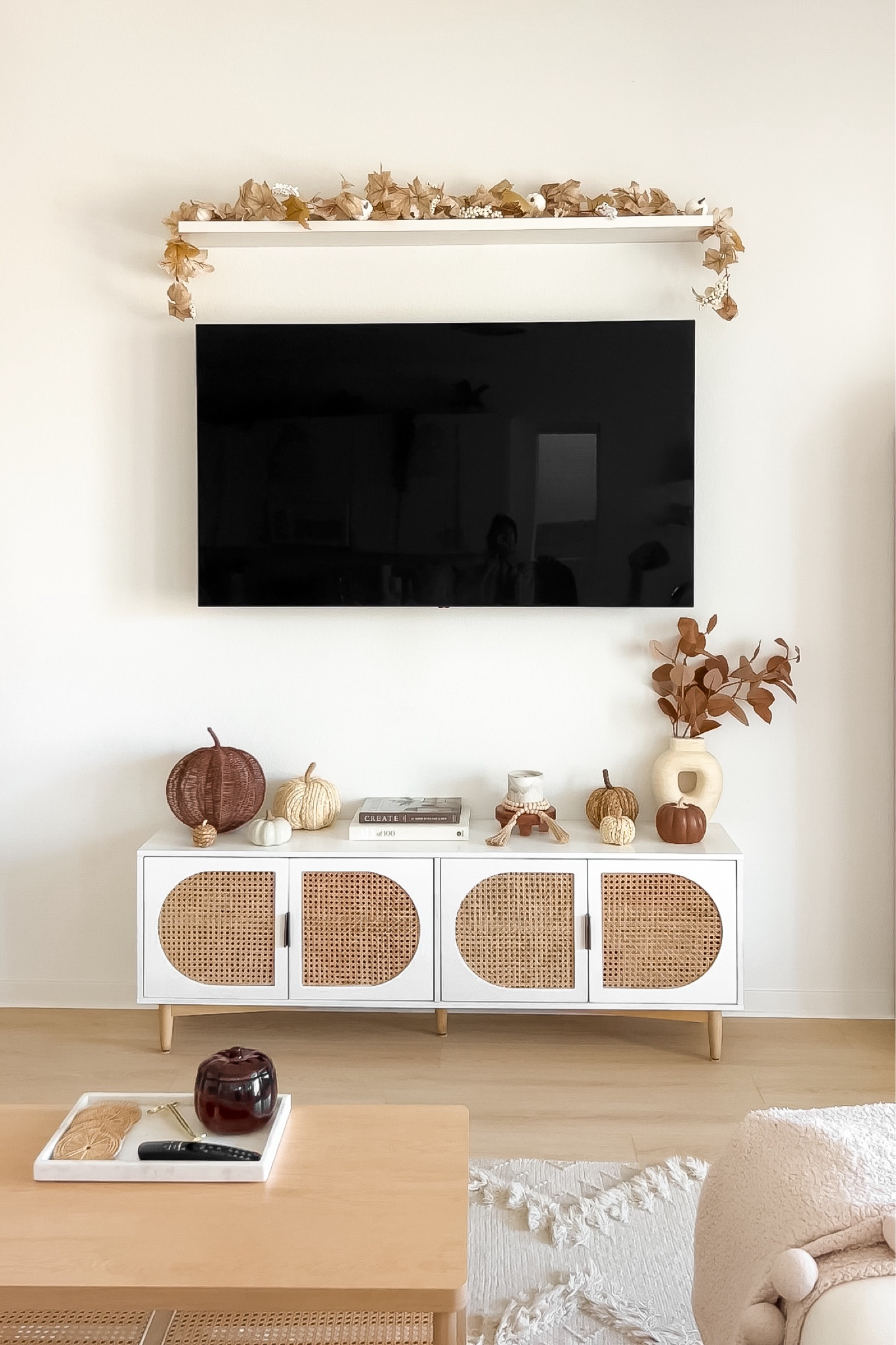 Fall living room decor (linked similars for oos items) | fall decor, fall home decor, fall decor living room, living room fall decor, fall tv console styling, fall garland, woven pumpkins, rattan pumpkins, pumpkin candle, coffee table books, faux brown eucalyptus, Target home, Amazon home

#LTKHome #LTKFindsUnder100 #LTKFindsUnder50