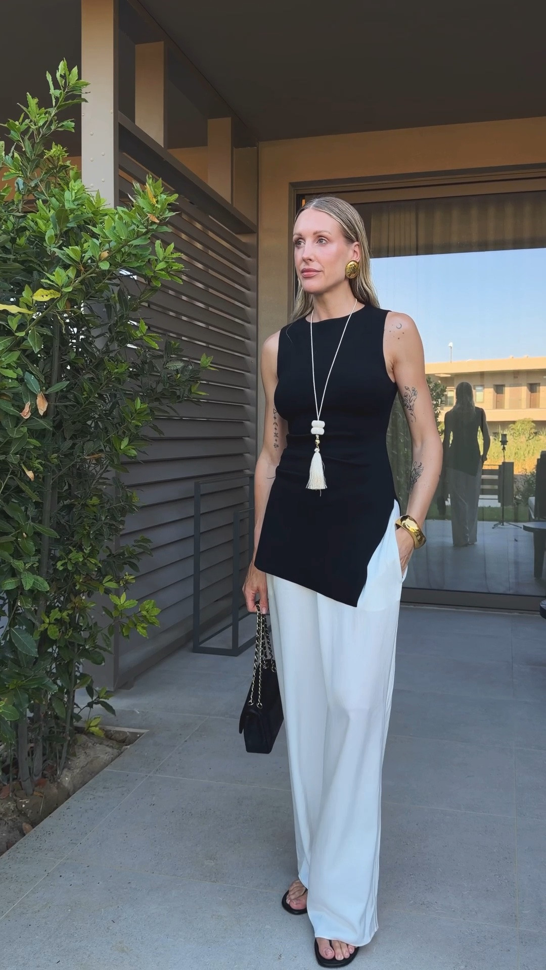 Minimal simple holiday outfit styling satin silk trousers 🤍 

Top Dissh size Small 
Tassel pendant mint velvet

#LTKuk #LTKsummer #LTKeurope