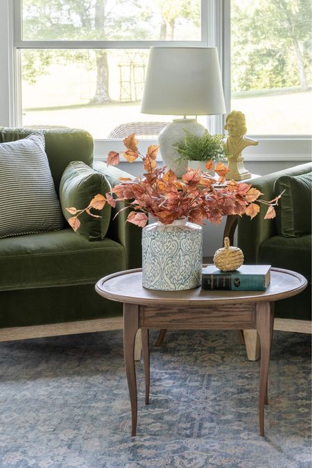 I love these green velvet chairs in the sitting room off of the kitchen. All set with fall decor 

#LTKhome #LTKSeasonal