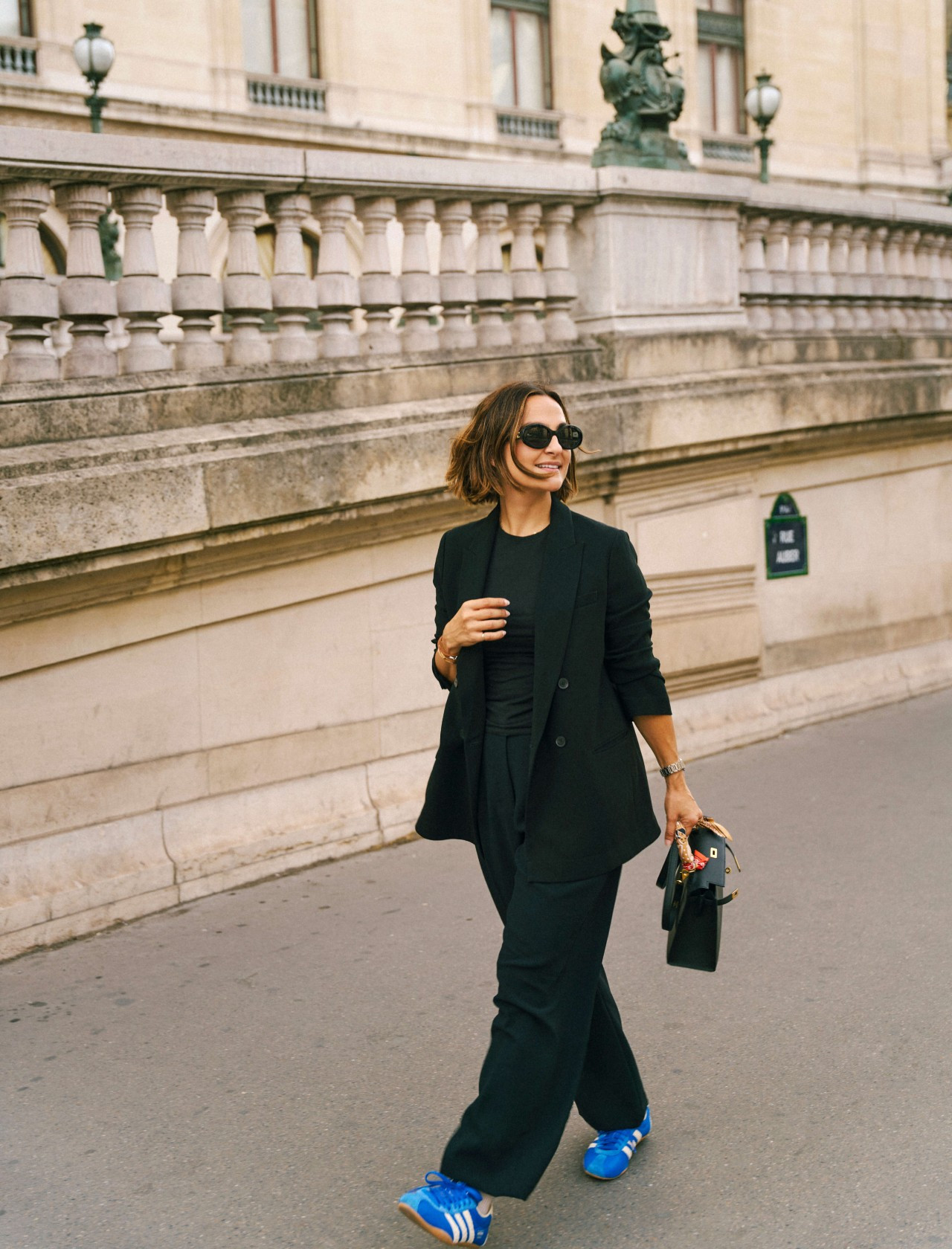 An easy way to make black trousers feel less corporate: pair them with a matching blazer and tee, then add colorful sneakers for a sporty, unexpected finish. Perfect for the office, travel, or a day in the city!  

 #LTKSeasonal #LTKTravel
