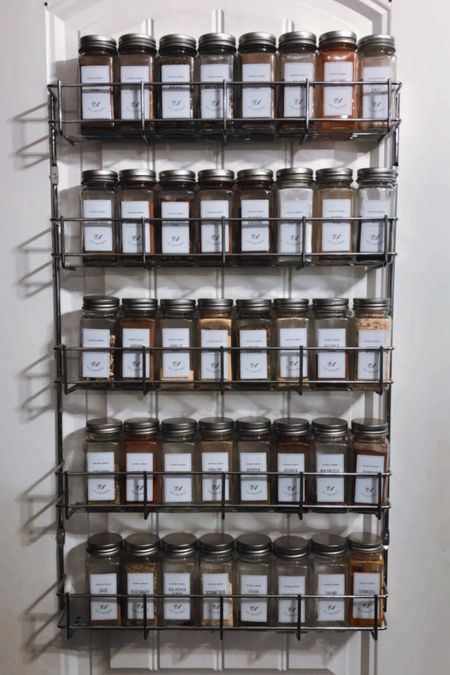 Pantry spice rack organizer and glass spice jars with labels. 

#LTKOver40 #LTKFamily #LTKHome