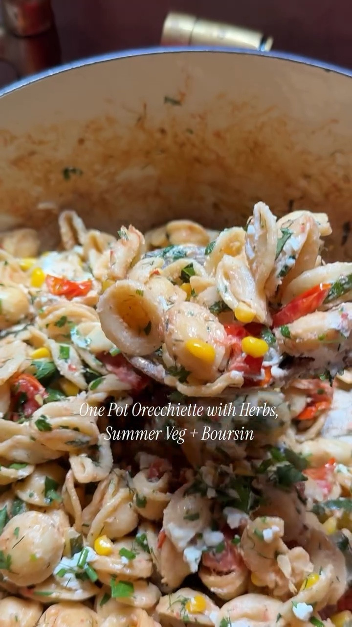 Serves 4 to 6

1 pound orecchiette
Kosher salt
3 tablespoons salted butter
2 cups grape tomatoes
1 medium zucchini
1 cup frozen corn
2 garlic cloves, finely grated
Coarsely ground black pepper
Finely grated lemon zest and juice of one lemon
1 (5.3-ounce) package garlic and herb Boursin, divided
1 cup mixed fresh herbs (e.g. basil, parsley, dill, and/or chives), coarsely chopped


#LTKFamily #LTKHome #LTKStyleTip