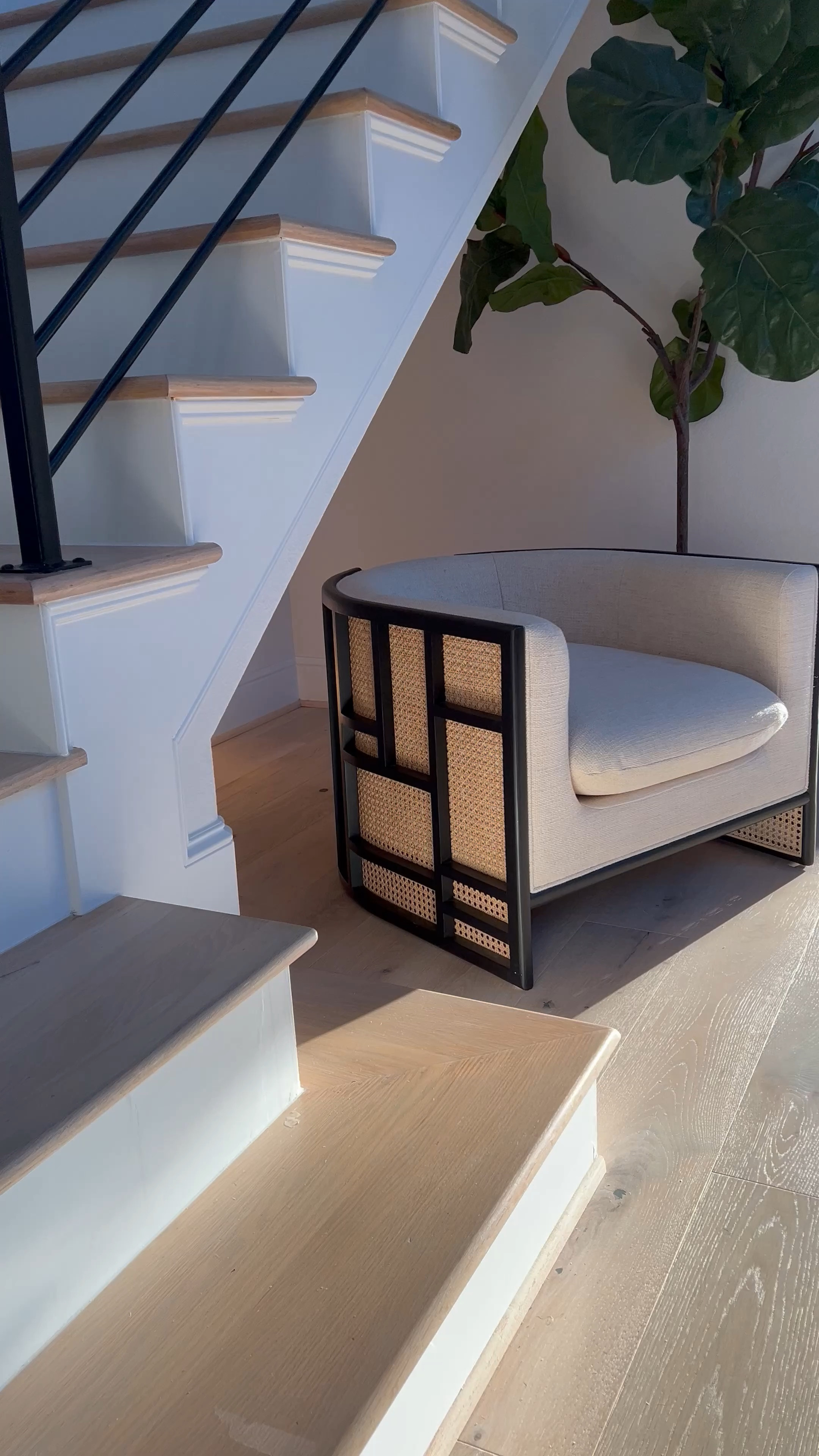 This chair is truly classic!… I 💯 believe this is one of the few rattan pieces that will stand again test of time/trends. ☺️🎉 

It comes in two color options and is the perfect piece if you love curved furniture. Let’s talk about the design for a second - I mean, just breathtaking! …. Even better in person 🥰 I love low & wide profile furniture pieces bc they make especially smaller spaces feel larger. This accent chair is a great addition to any space. 🖤🤍

 I’ve had these accent chairs for almost two years and the fabric/threads are incredibly durable and stain resistant and have only lightly cleaned them once! 🎉 

#LTKVideo #LTKsalealert #LTKhome