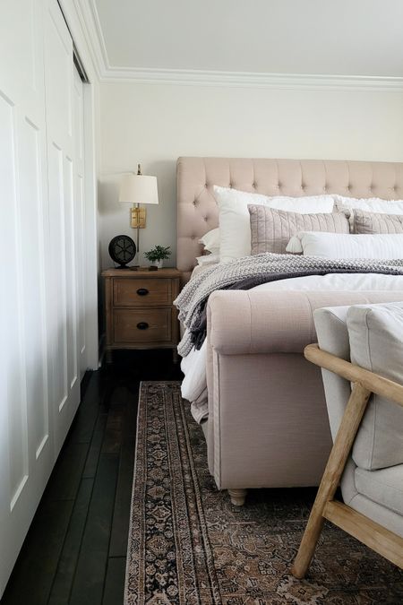 Bedroom inspo with the most beautiful vintage inspired neutral rug!Bedding, primary bedroom, wall lamp, sconce, primary bedroom

#LTKhome #LTKfindsunder100