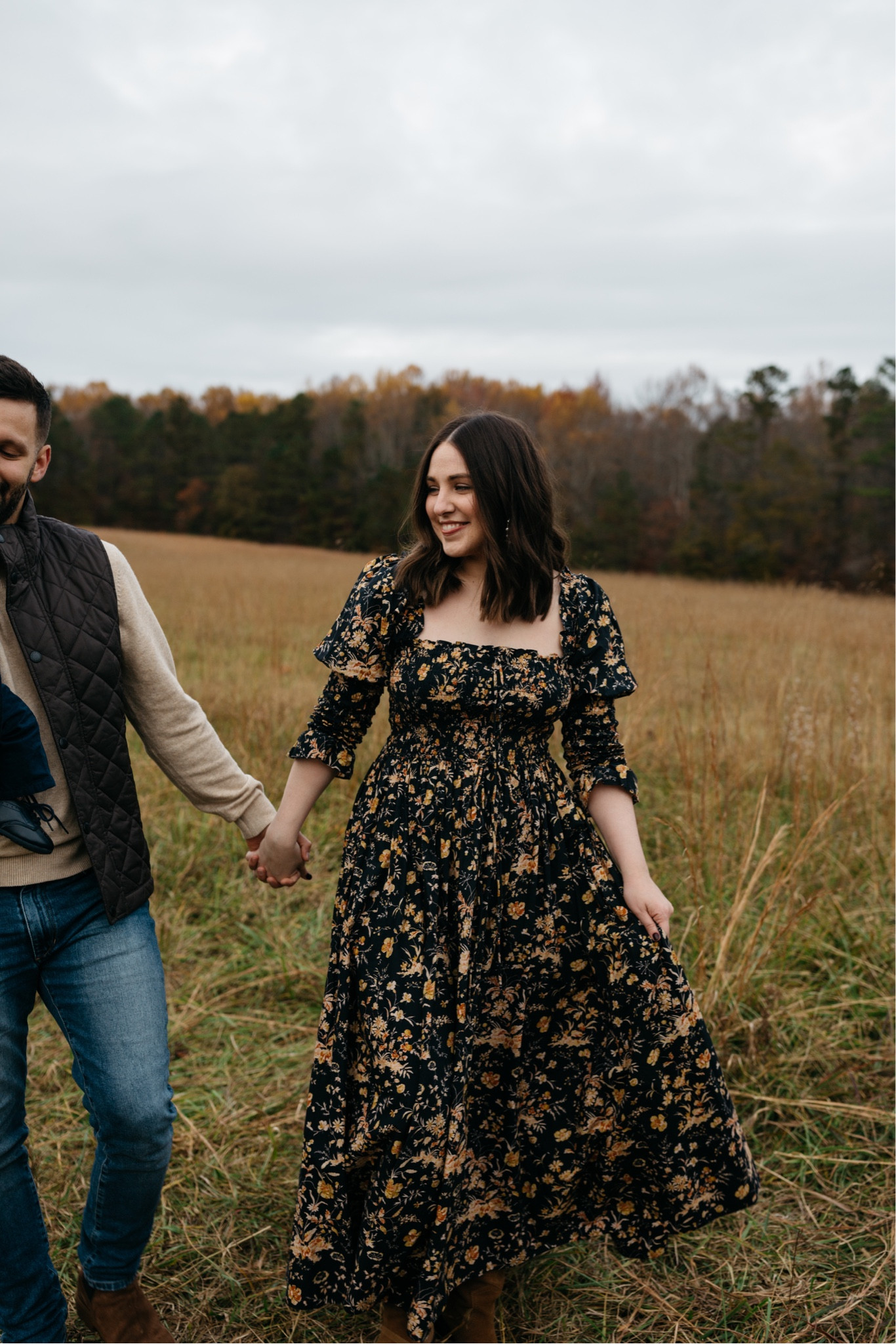 Doen Bijou Dress for fall photos. Navy blue base with neutral colored flowers  One of my most favorite pieces I own  

This would be a beautiful maternity dress or for postpartum as well. The top is stretchy and the waistline is flowy. 