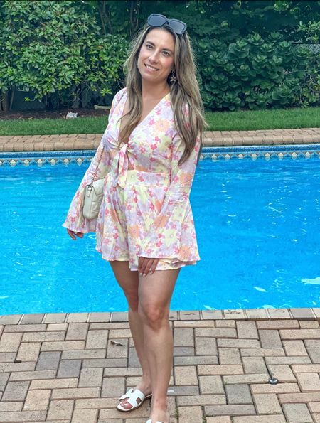🚨SALE🚨 
My romper is on sale for ONLY $20.00 on Pink Lily. It comes in other patterns that are on sale as well. Pair it with these Steve Madden Sandals and a white bag and you have a beautiful but casual look. 

#LTKunder50 #LTKSale #LTKSeasonal