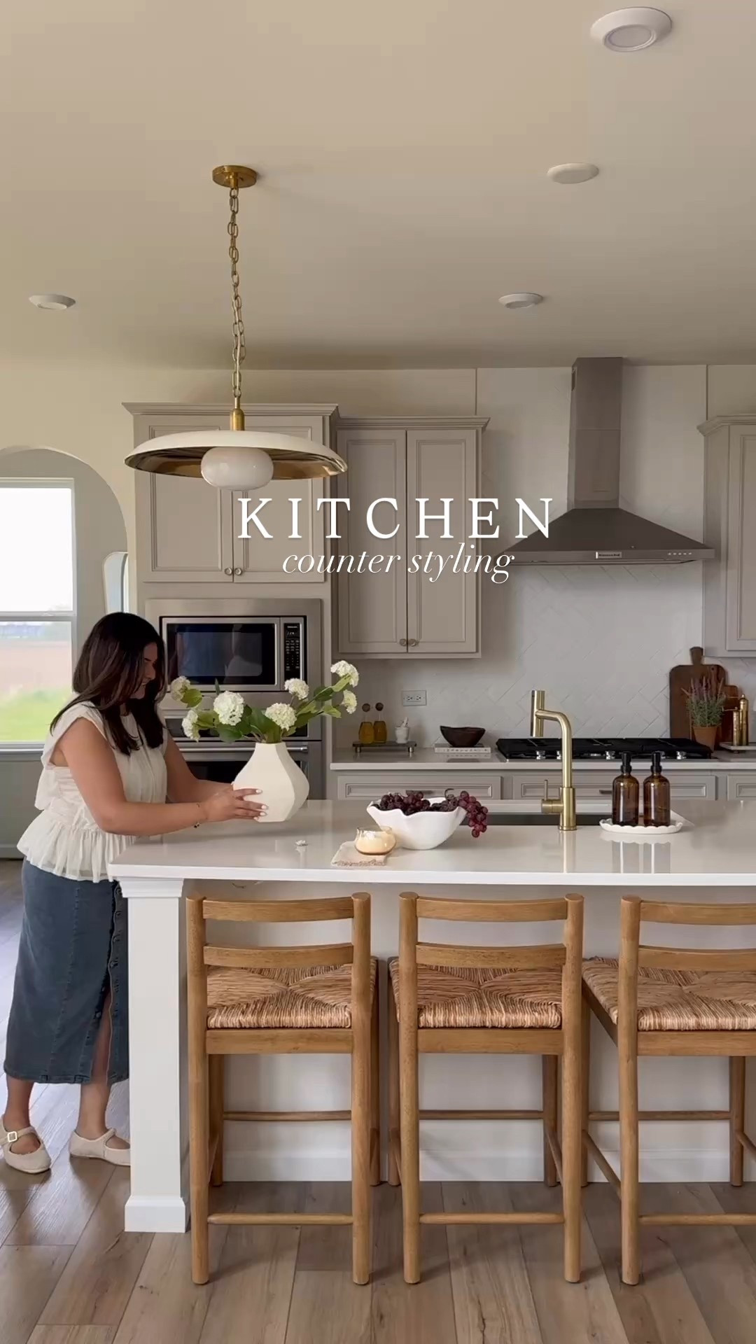 Kitchen counter styling! 

I’ve been wanting the kitchen to feel a little more styled but still easy and functional. I kept things simple on the counters, added a few intentional pieces & a mini lamp(that scalloped linen shade totally convinced me) for the soft glow. A few earthy touches around the island too to make the space feel more inviting! 

Mini lamp- earthy kitchen styling- kitchen island styling 

#ltksummer #ltkover40 #ltkhome 

#LTKHome #LTKFindsUnder50 #LTKFindsUnder100