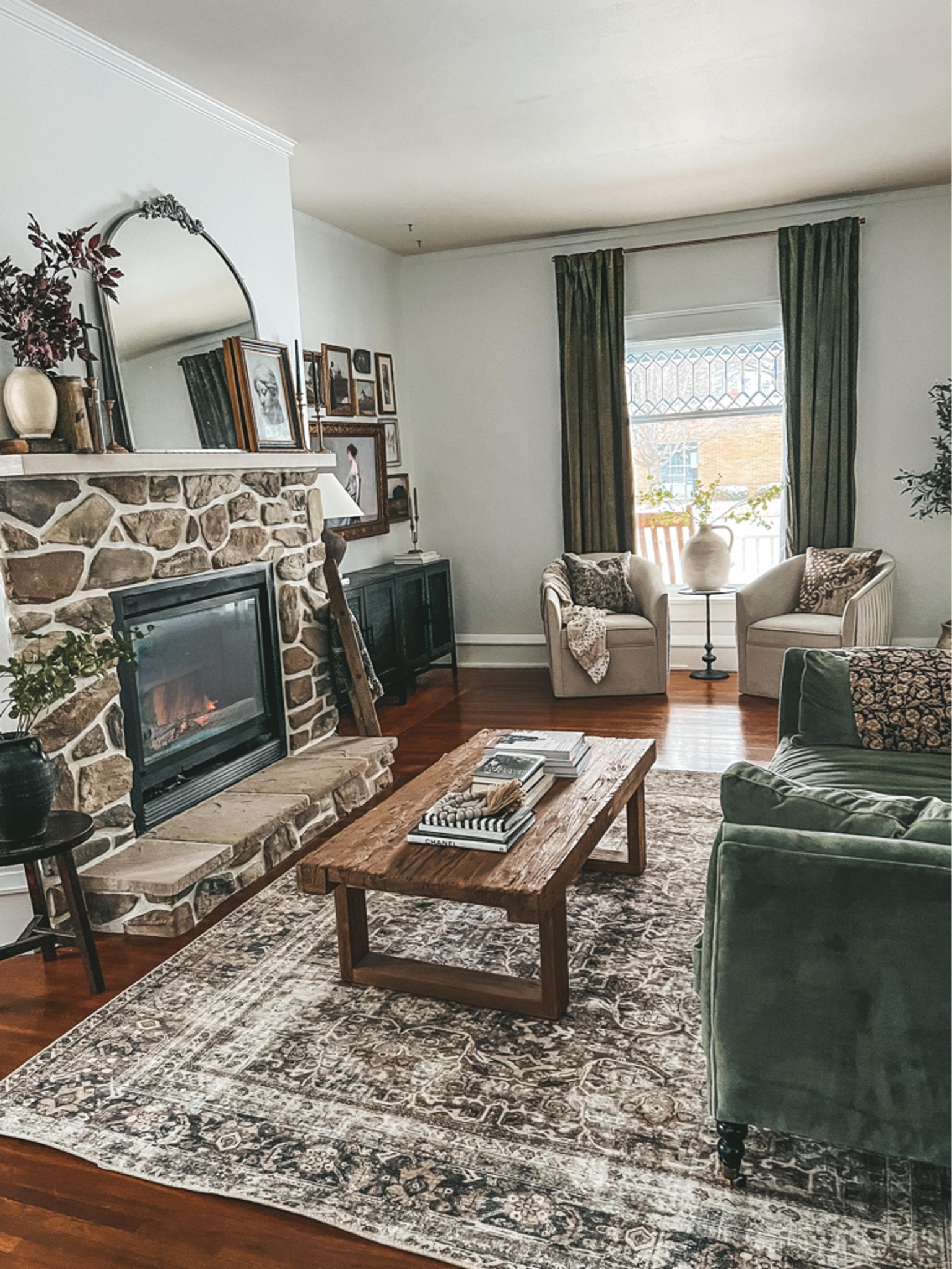 Shop my living room. Lulu and Georgia Tulca mirror, Joanna Gaines x Loloi rug, coffee table, sofa, accent chairs, home decor. 

#LTKhome #LTKstyletip #LTKFind