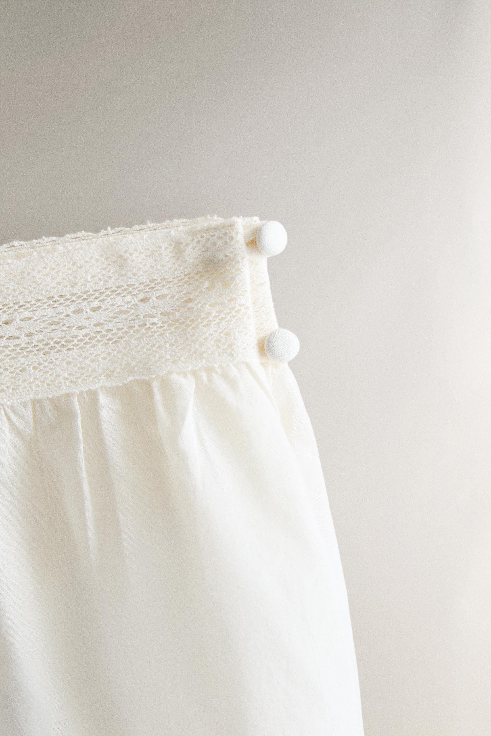Loose-fit culottes shorts made of cotton. Plain design with an elastic waistband and lace detail ... | Zara US