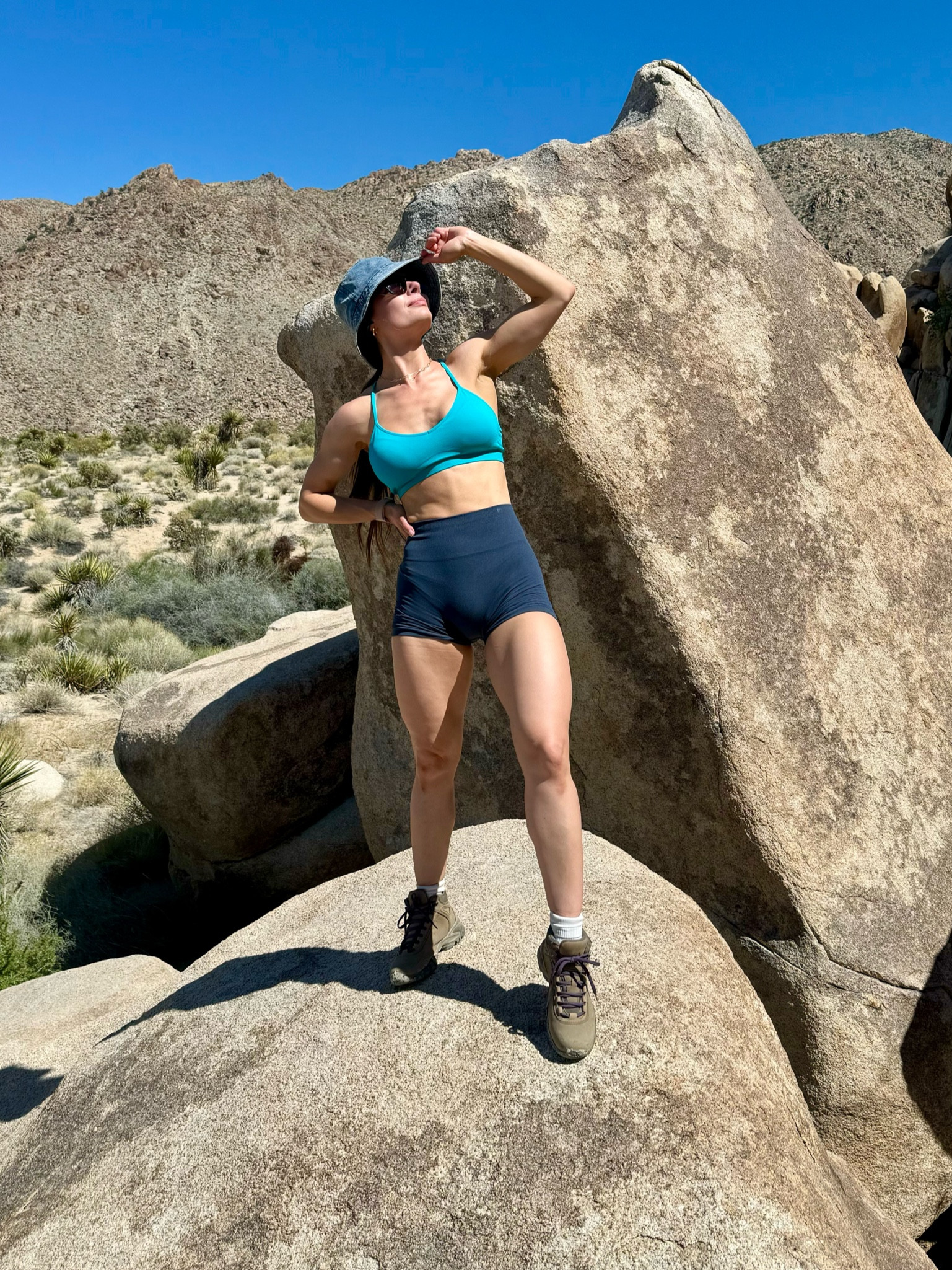 My must have hiking/adventure outfit that I wore while hiking in Joshua Tree 
🥾🌵🏜️ 

Size small shorts, size medium sports bras, size 7.5 hiking boots (I sized up half a size to fit insoles). 

#LTKActive #LTKSaleAlert #LTKFindsUnder50