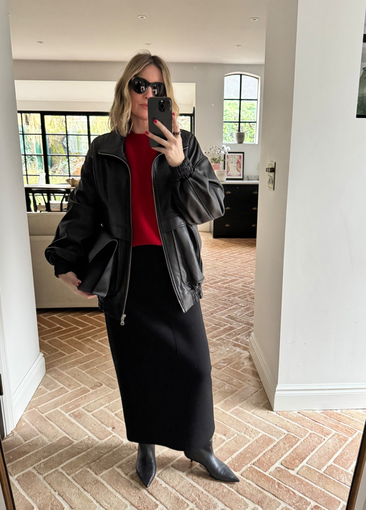 Red Knit + Black Midi Skirt + Boots + Leather Funnel Neck Jacket 

#LTKFashionMonth #LTKspring #LTKdatenight