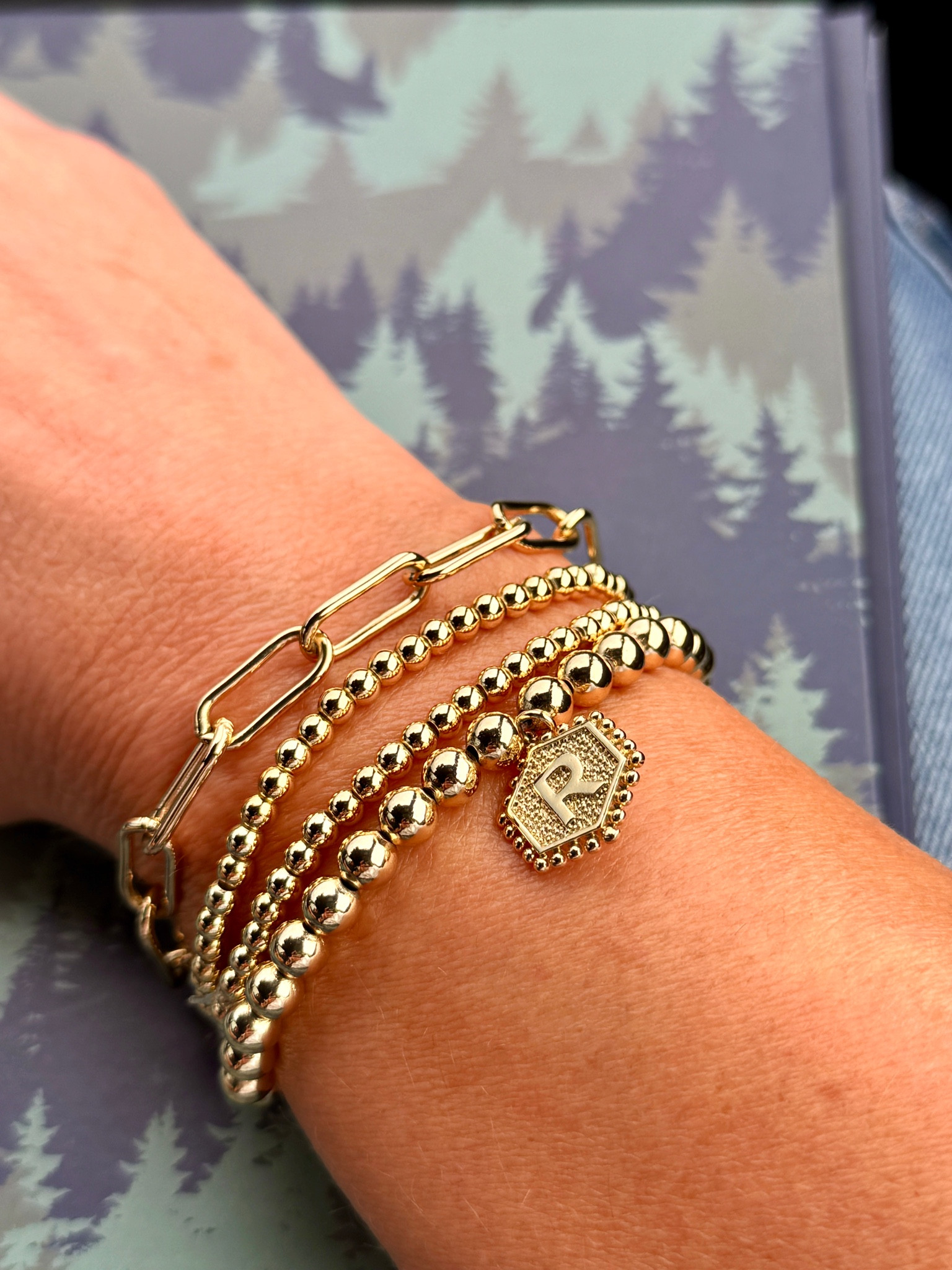 14K Real Gold Plated Stretch Bead Ball Bracelet stack with Letter Pendant. 
Amazon bracelet. Gift idea  

#LTKStyleTip #LTKFindsUnder50 #LTKGiftGuide