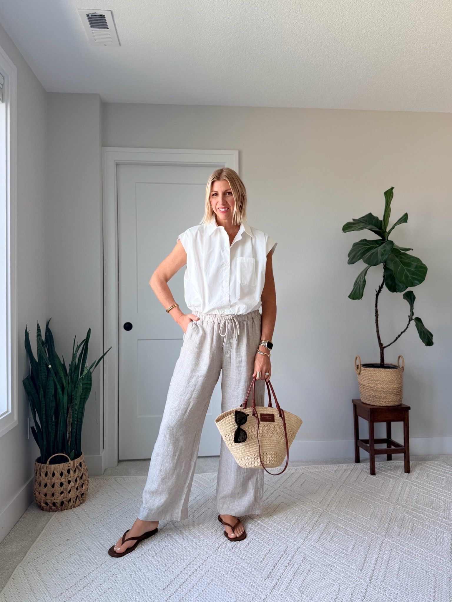 This is the kind of outfit I’d pack first for a summer trip: a crisp cotton blouse, relaxed linen pants, and simple sandals.

It feels effortless but still elevated — exactly what we want when we’re building a wardrobe around versatile pieces that work for real life.

Perfect for travel days, dinner by the water, casual office days, or anytime you want to look polished without trying too hard. Linking the full look here.

#LTKOver40 #LTKSummerStyle #LTKTravel #LTKStyleTip

#LTKootd #LTKSeasonal #LTKOver40