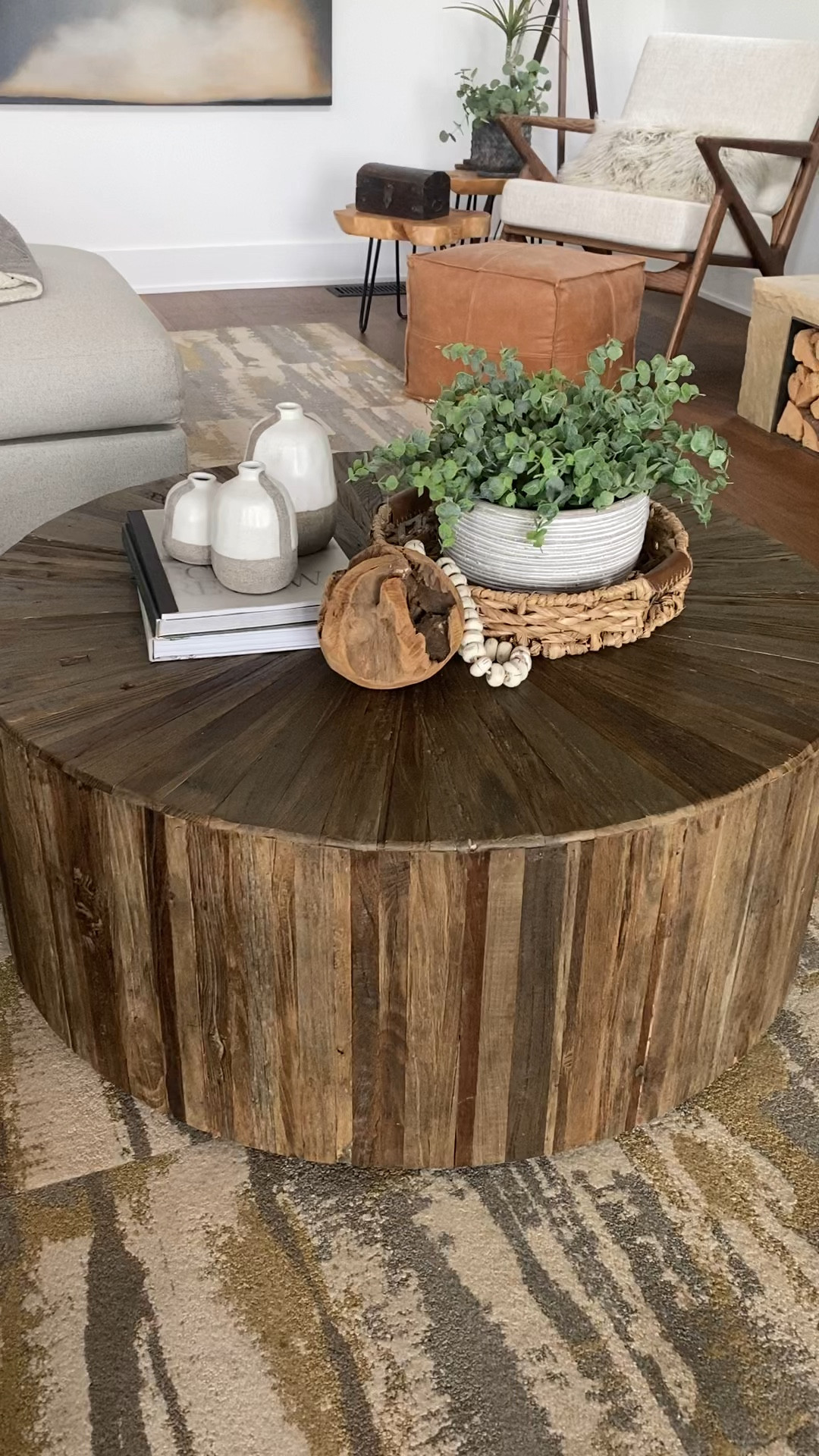 This coffee table has such a good medium brown colorway with so much texture.  I love the Creative Coop vase set, book and beads. 

#LTKHome