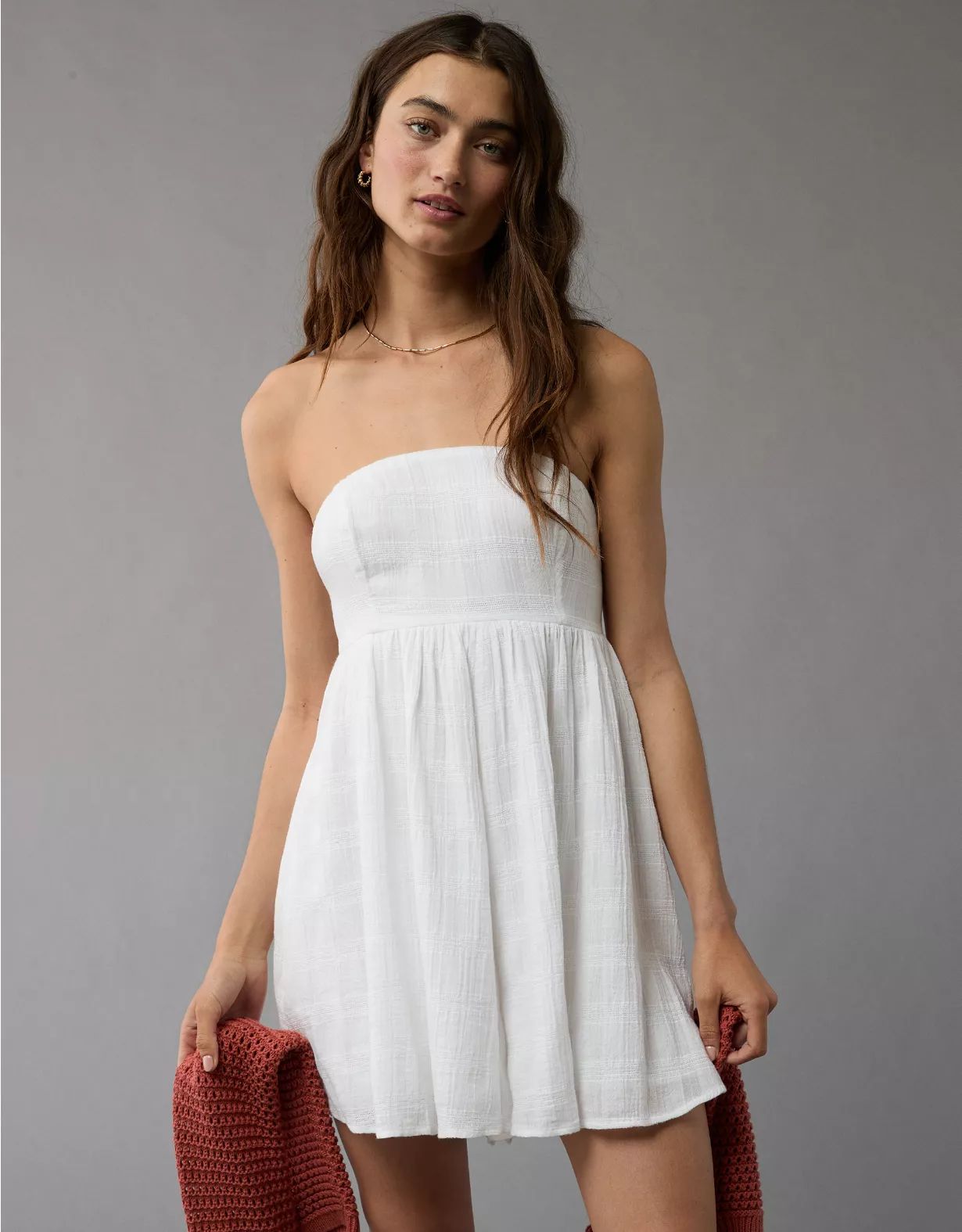 AE Strapless Tie Back Babydoll Romper | American Eagle Outfitters (US & CA)