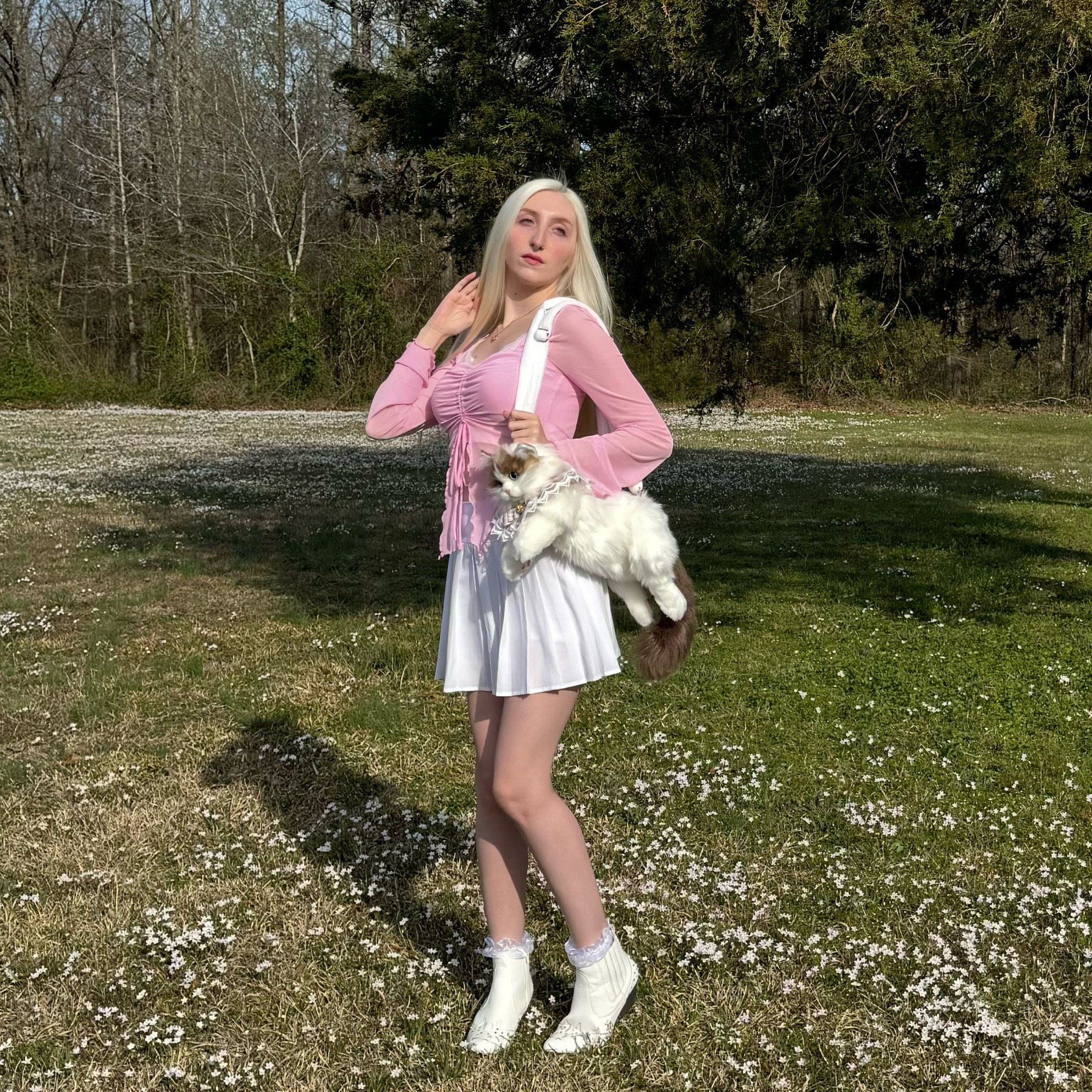 Exact products linked below except for the shoes, along with cute alternatives! Wearing a cute pink mesh top in size XS along with a pink lace cami underneath in size XS. Paired with a white pleated skirt size Small, with white boots and ruffle socks. The exact cute cat purse is linked below! 💕

#LTKfindsunder100 #LTKSeasonal #LTKsalealert