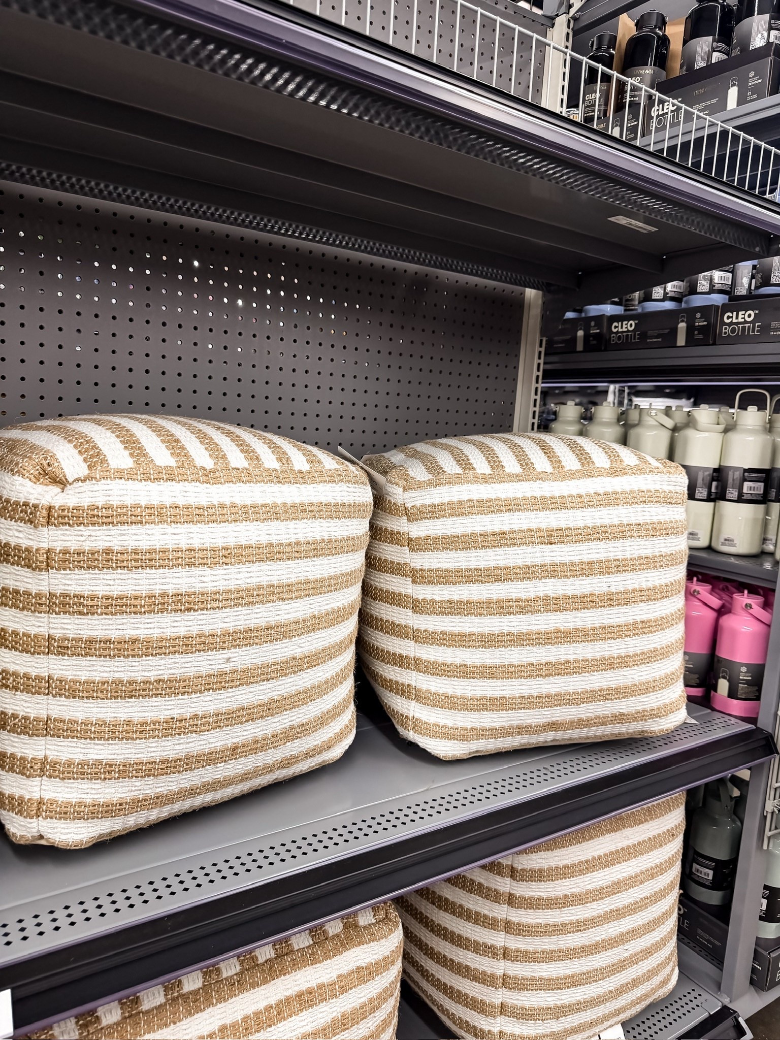 These are such a good find 🤎The neutral stripe + textured fabric feels way more elevated than your typical pouf. Perfect as extra seating, a footrest, or styled under a console to make a space feel layered and pulled together

home decor, pouf styling, neutral decor, living room styling, woven texture, target finds, affordable home, themominstyle 

#LTKMothersDay #LTKSeasonal #LTKHome