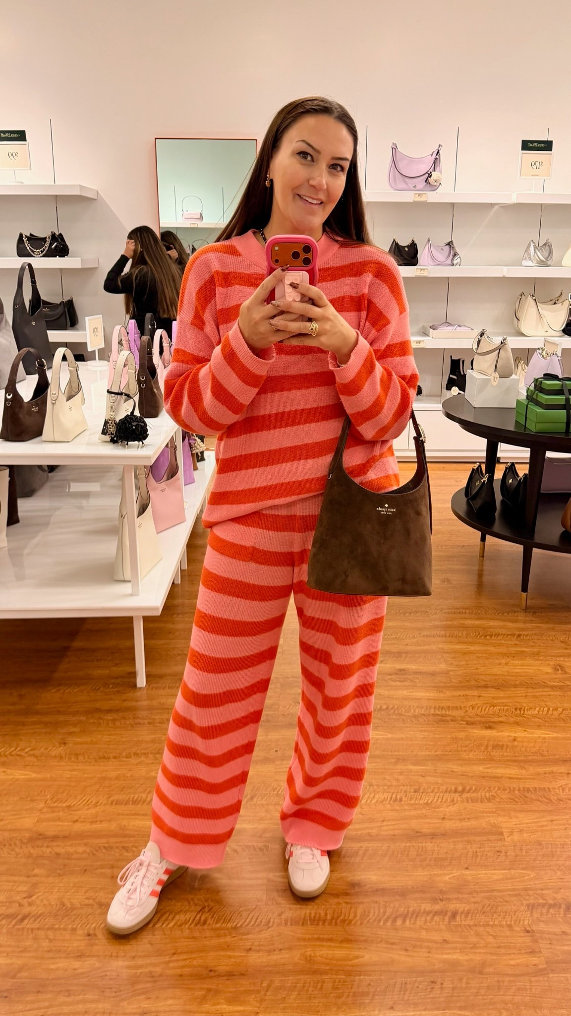 girl… ever have one of those days where you just want to feel put together without trying too hard? 🙃 this striped knit set is that outfit. it’s comfy enough for errands and travel, but still cute enough that you look intentional when you walk out the door. the fabric is soft, warm, and drapes in a way that actually flatters curves instead of fighting them — because you buy clothes to fit your body, not the other way around. 💃🏻✨

the wide leg gives you room through the hips (curvy girl approved), and the matching top makes it feel styled without the mental effort. toss on sneakers or dress it up with a boot… it works for literally everything. 🫶

I’m 5’6” wearing size small (TTS) in the sweater, size medium (TTS) in the pants, and size 8 (TTS) in the sneakers 👟

which color would you grab? 👇🩷🧡💛

#LTKSeasonal #LTKdayinmylife #LTKootd