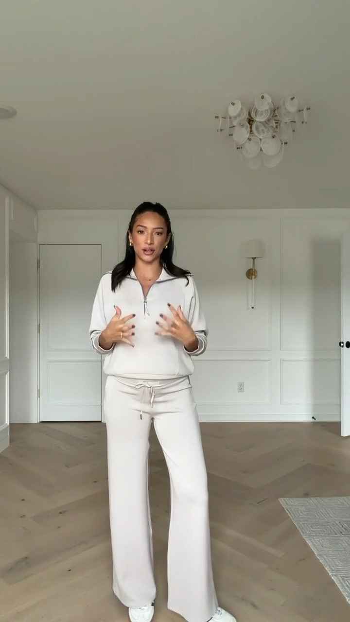 Spanx set 30-50% OFF!! This set is made with the most buttery soft material - it’s my go to travel and lounge set and I wore it all throughout my pregnancy too!! Wearing size S track jacket and size S tall wide leg pants here and I'm 5'8" 🖤 

work from home outfit, airport outfit, travel outfit, errands outfit, spanx outfit, spanx sale, loungewear

#LTKSaleAlert #LTKTravel