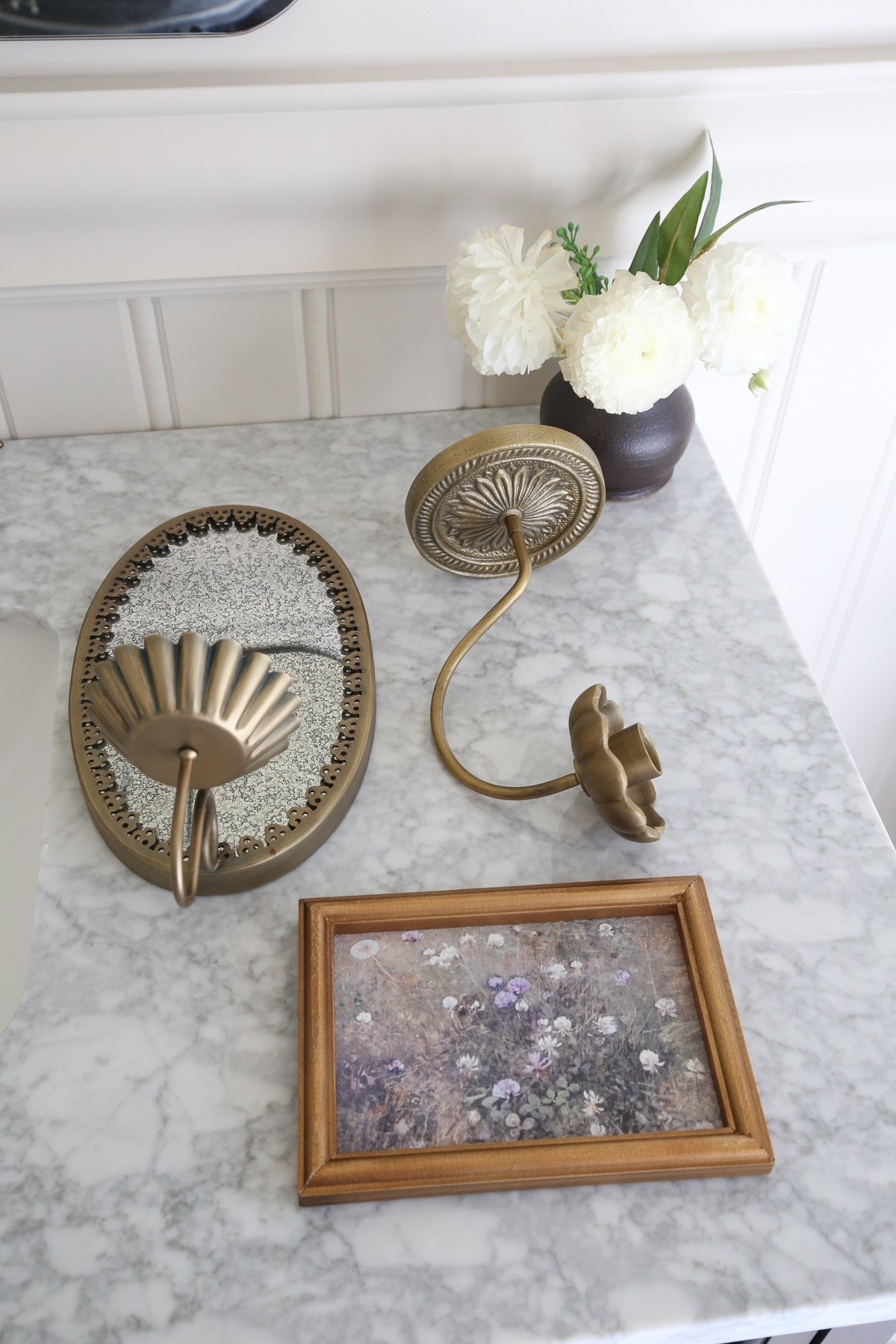 Charming bathroom finds - brass candle wall sconce, antique mirror candle wall sconce, floral art print in a brass picture frame

#LTKStyleTip #LTKHome