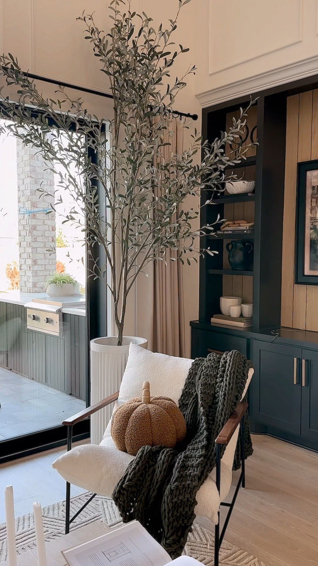 Faux Olive Tree from Potterybarn is 9 feet and planter is the Extra Tall in Chalk color! 

#LTKhome #LTKsalealert #LTKSeasonal