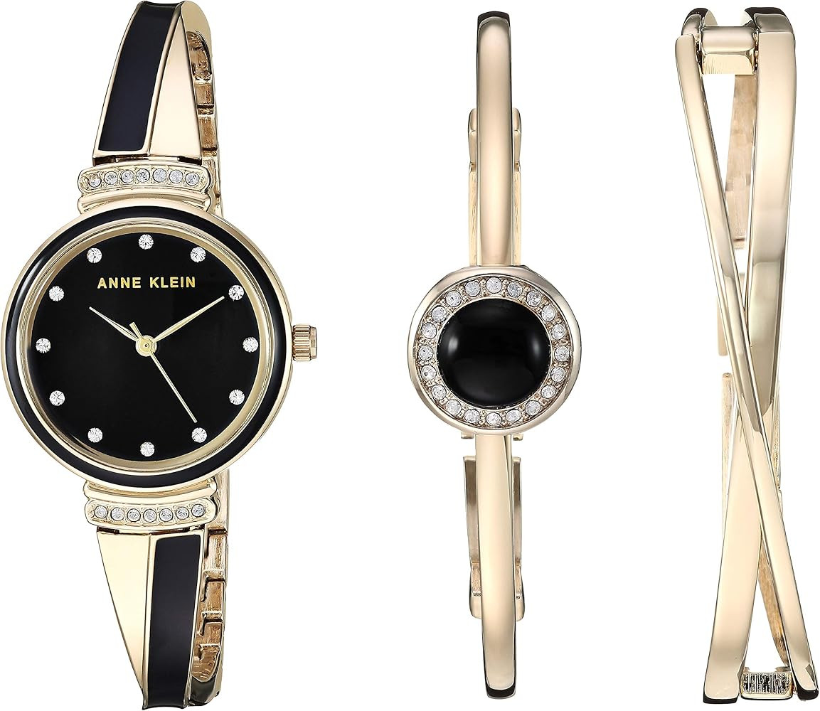 Anne Klein Women's Crystal Accented Watch       
Band Material: Metal | Amazon (US)