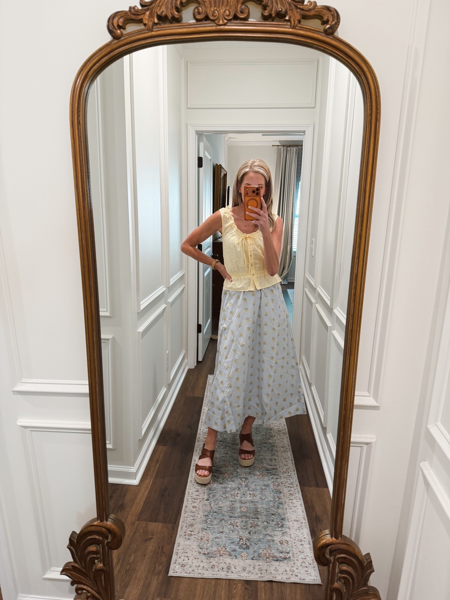 The trending set of the summer is this casual eyelet miniskirt paired with this beautiful button front matching tank. 
These styles will go anywhere you go wearing an extra small and both. Top is $22 skirt is $30.