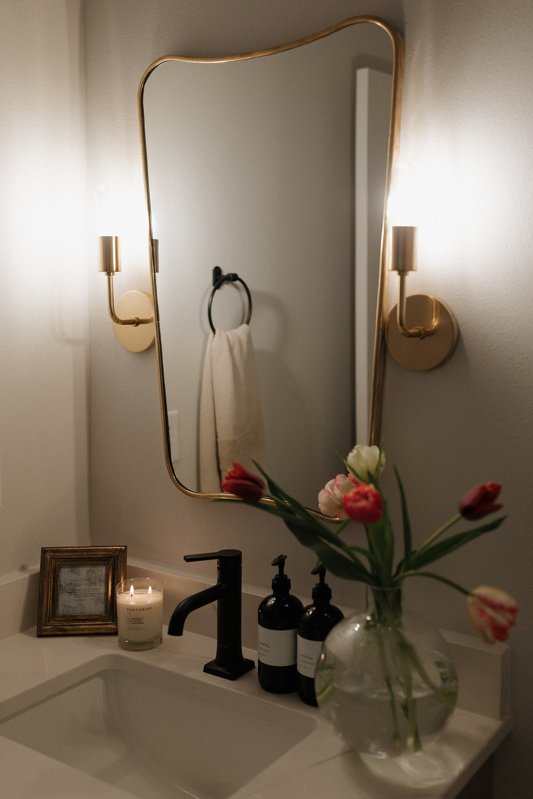 Shop everything in our powder room! // Wall Color: First Star by Sherwin Williams // Flooring: Coretec LVP in Springfield Oak // Cabinets: Custom by Countryside Cabinets in North Pier 

 #LTKHome