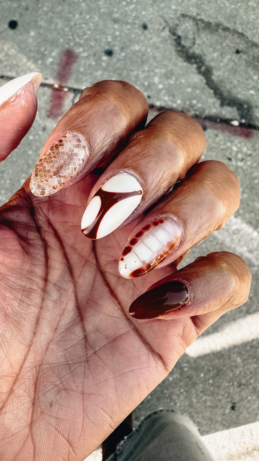 Showing off snake skin on my nails 💅🏽 and my new jorts 🐍

#LTKFindsUnder100 #LTKStyleTip