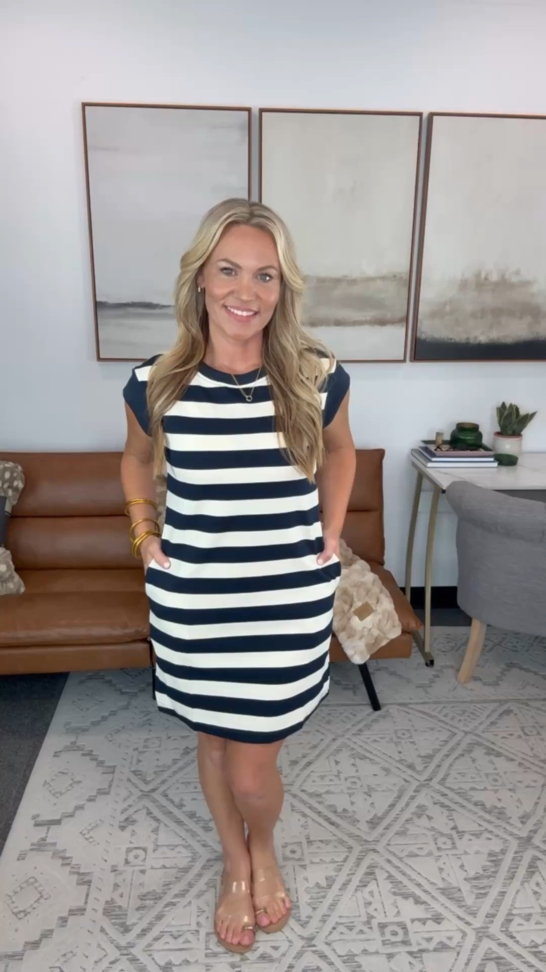 I packed this dress for a recent trip because I knew it would be an easy throw on after long days. The fabric is soft without being clingy, the relaxed shape keeps you comfortable in the heat, and the pockets are actually useful. It’s one of those dresses that works with sandals now and a denim jacket when the weather cools off.

Striped dress, navy striped dress, casual dress, pocket dress, travel outfit, everyday dress, comfortable summer dress, fall transition outfit, boutique fashion, effortless style, AudrieDollins

#LTKootd #LTKmomlife #LTKTravel
