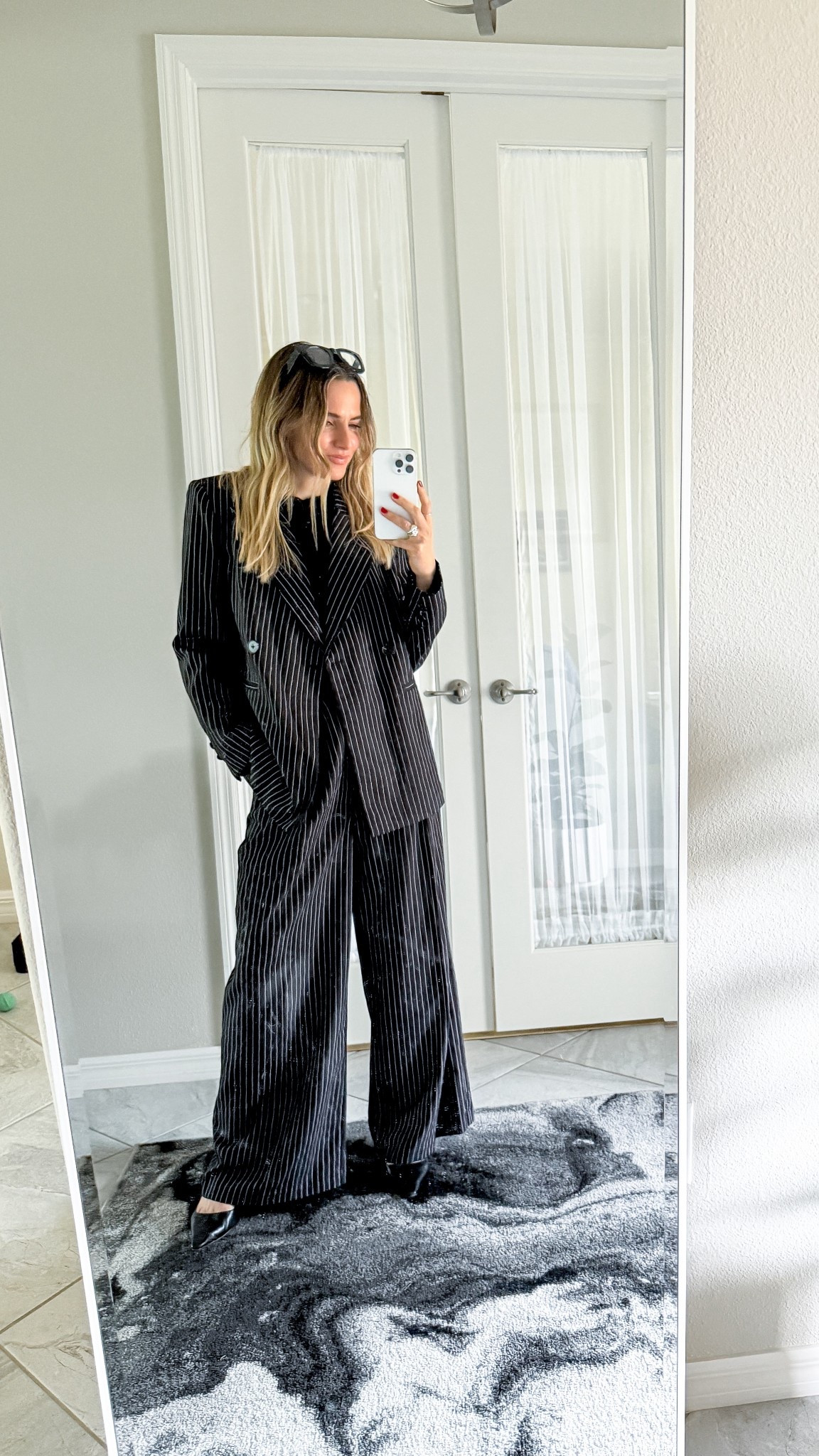 because corporate style doesn’t have to be boring 💼 i’m obsessed with this pinstripe set — the relaxed, wide-leg fit gives it that modern, effortless edge while still feeling super polished. paired it with pointed heels for a sleek, office-to-event vibe 🤍

wearing a size small in both pieces. the blazer is structured but comfortable, and the high-waisted pants have just the right amount of drape for that quiet luxury feel.

#corporateoutfits #corporategirl #officeoutfits #corporatestyle #officeoutfitideas 

#LTKWorkwear #LTKSeasonal #LTKStyleTip