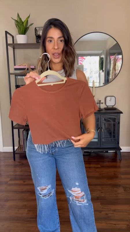 Nashville top on a fuller bust babe! Styled 2 ways. Obsessed with the fringe on this Amazon top. I’m a 34DDD, and I’m in a small. My bigger bust fits up top but there’s still some extra length. Perfect for a country concert! I paired with flare jeans from Free People (of course!), black cowboy boots and then cutoff jean shorts and a cowboy hat. Nashville outfit, viral jeans, fringe top, country concert outfit, summer outfit inspo

#LTKfindsunder50 #LTKfindsunder100 #LTKSeasonal