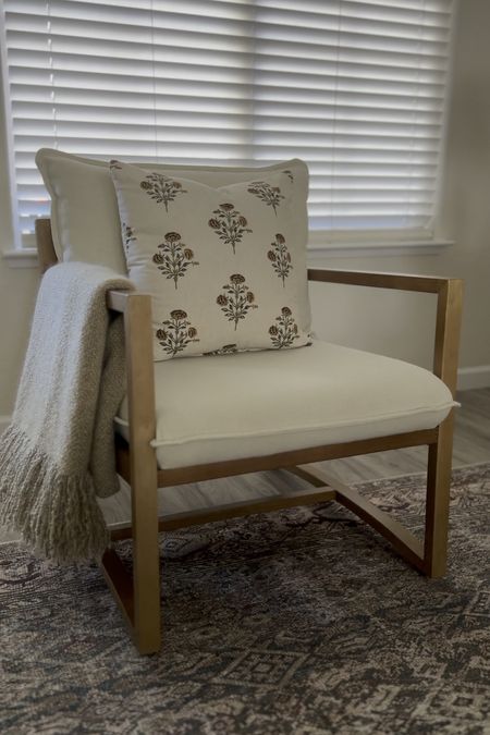 I found the prettiest throw pillow to put on my favorite armchair; and the best part is - it’s only $20! Throw pillow,  upholstered furniture, armchair, Higgins sling back chair, area rug, Studio McGee, Target, Loloi, Threshold

#LTKHome #LTKStyleTip #LTKVideo