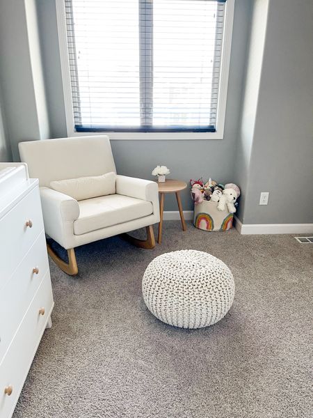 Super comfy nursery rocking chair! Chair comes in several colors and is available on Amazon & Target. Poof has silver thin threads through out out. It’s so pretty and it’s from Amazon. Dresser came with white pulls but we replaced them with pulls from Amazon. 

#LTKbaby #LTKhome #LTKkids