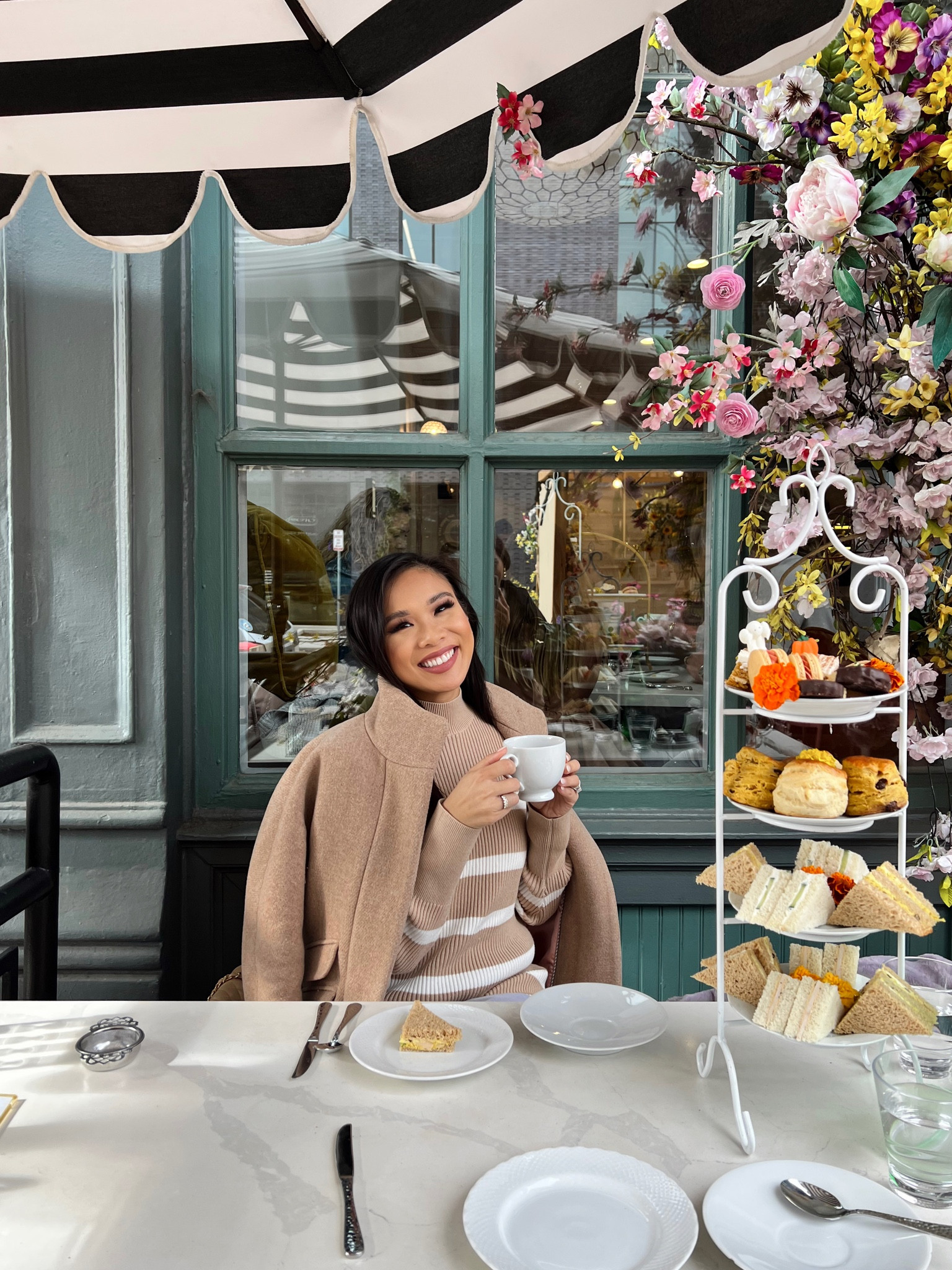 Fall outfit with a striped sweater dress, wool coat and a Chanel Brooch. Wearing size XS in the dress and petite 00 in the coat, which is on sale! Great for workwear and business casual!

#LTKSeasonal #LTKstyletip #LTKsalealert
