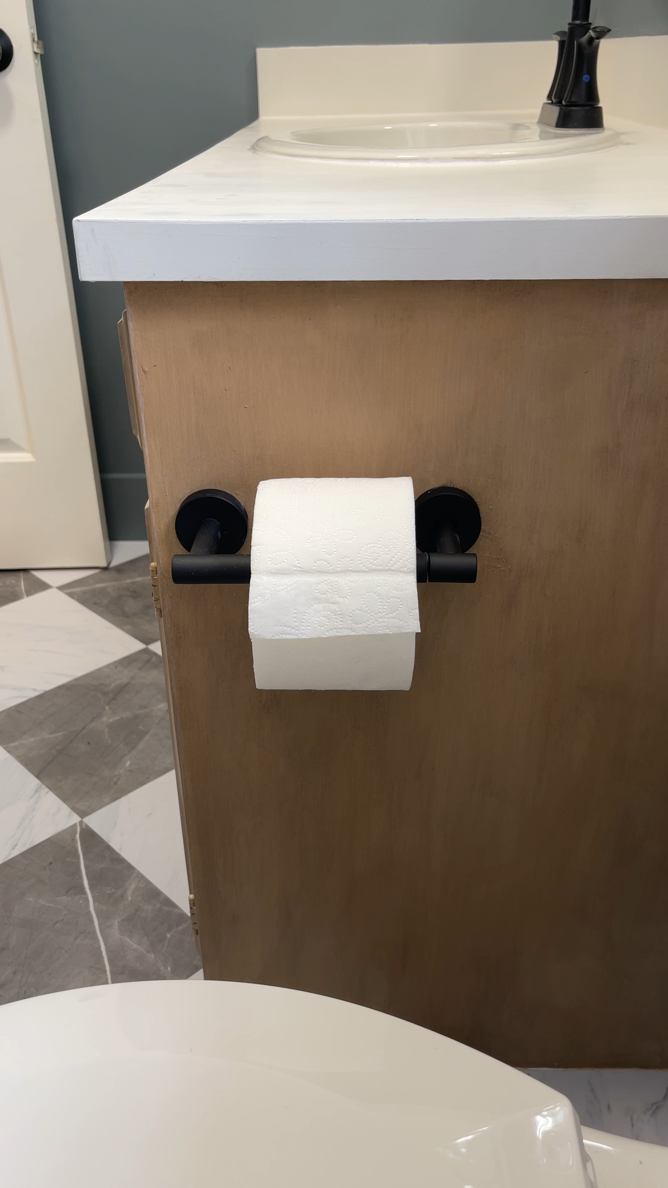This is the TP holder for my boys bathroom. I love that it stays in place and is easy to change out- just lift the arm up, slide a new roll on, put arm back down. Comes in several finish options. 

#LTKhome #LTKstyletip #LTKfindsunder50
