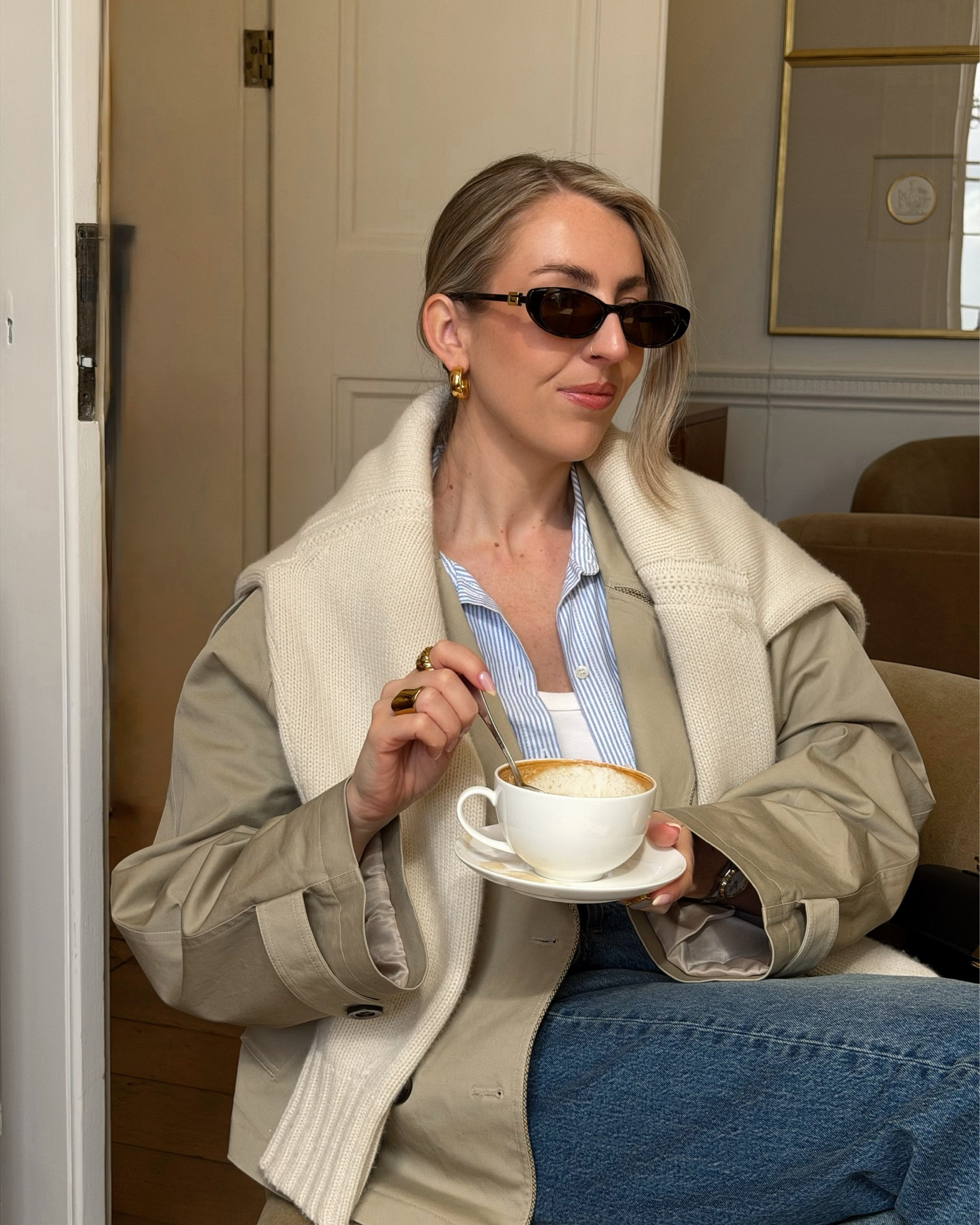 Love styling a jumper on the shoulders, so chic! ✨🤍

Blue shirt, short trench coat, cream jumper, jeans 

#LTKuk #LTKstyletip #LTKspring