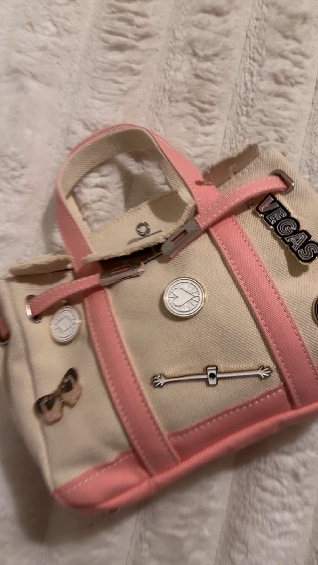 Compact charm defines this Sunwin Madaket mini classic tote bag, designed with a turn-lock belted flap closure in silver-tone hardware for secure storage. Two slip pockets and canvas lining combine with top handles and short shoulder straps for convenient, everyday use

#LTKootd #LTKTravel #LTKWorkwear