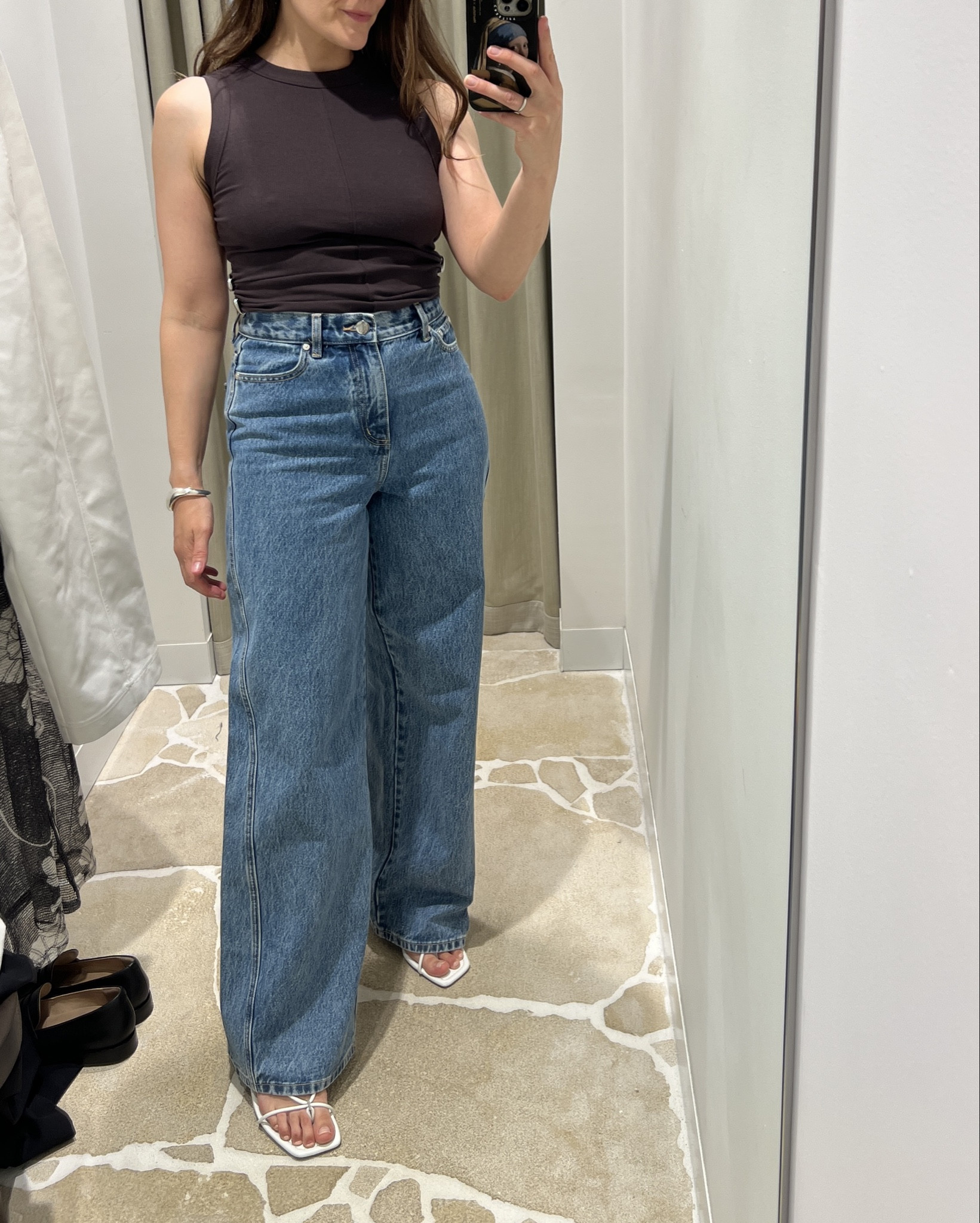 A chic cocoa brown tank top with silver metal details styled with the perfect wide leg jeans and white pants for spring. 

#LTKjeans #LTKspring #LTKaustralia