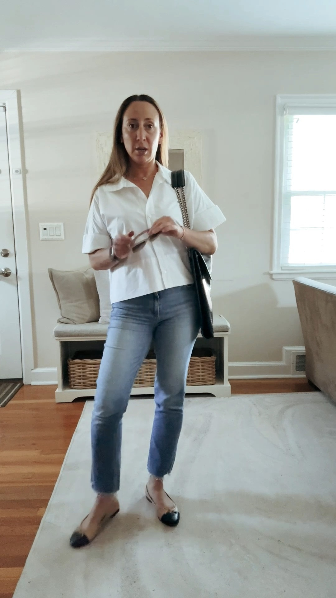 “Falling for layers 🍂 this fall outfit is all about comfy jeans, ballet flats, and a black leather handbag that pulls everything together. Perfect for those busy workwear days or a casual look that still feels elevated

The top is oversized so I’m wearing a small. Not sure if you can see it here but this top has the prettiest details including a wide hem and French cuff sleeves. So beautiful and effortlessly chic  

#LTKWorkwear #LTKStyleTip #LTKSeasonal