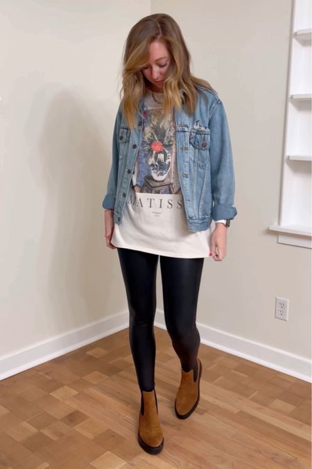 travel outfit inspo featuring the abercrombie matisse tee - this is pretty much my uniform for flights - spanx faux leather leggings, boots, an oversized tee, and my fave jean jacket. 

#LTKsalealert #LTKfindsunder50 #LTKSpringSale