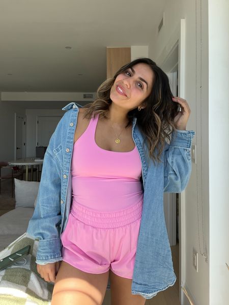 Comfy summer outfit from aerie - activewear onesie romper under $50 (SO comfy - wearing an M TTS), paired with an oversized denim shirt (on sale!!) wearing an M

#LTKsalealert #LTKfit #LTKFind